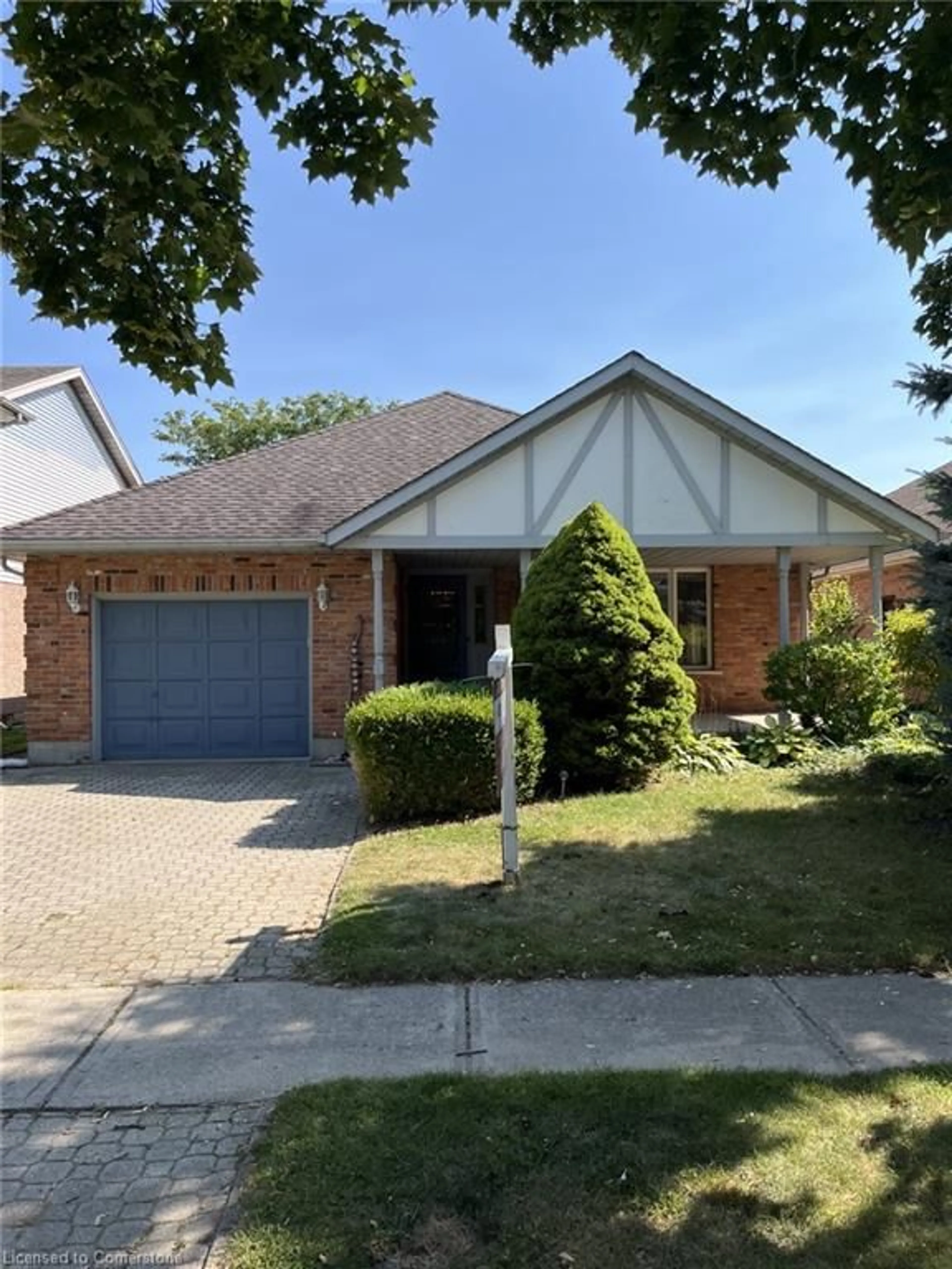 Frontside or backside of a home, the street view for 70 Sioux Cres, Woodstock Ontario N4T 1G4