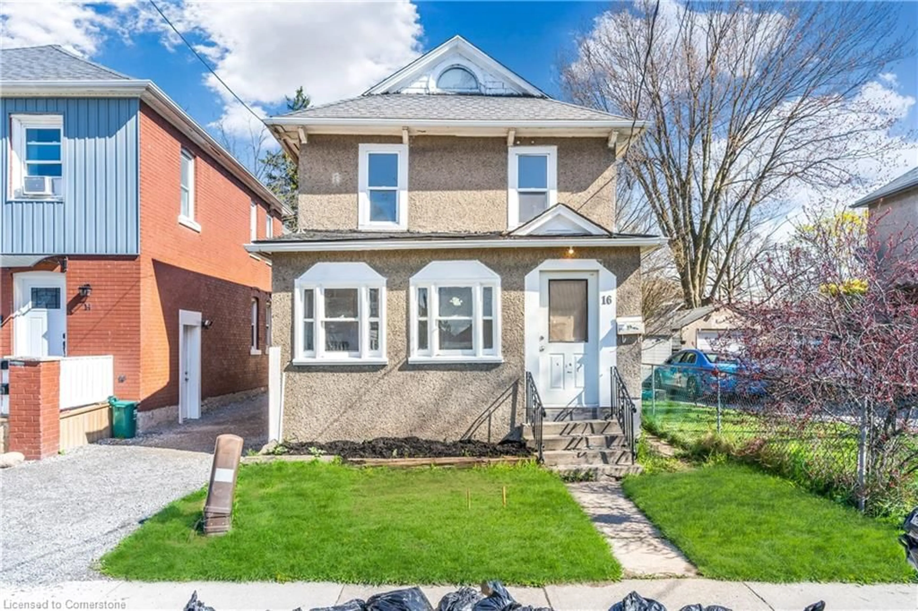 Frontside or backside of a home, the fenced backyard for 16 Albert St, Welland Ontario L3B 4L2