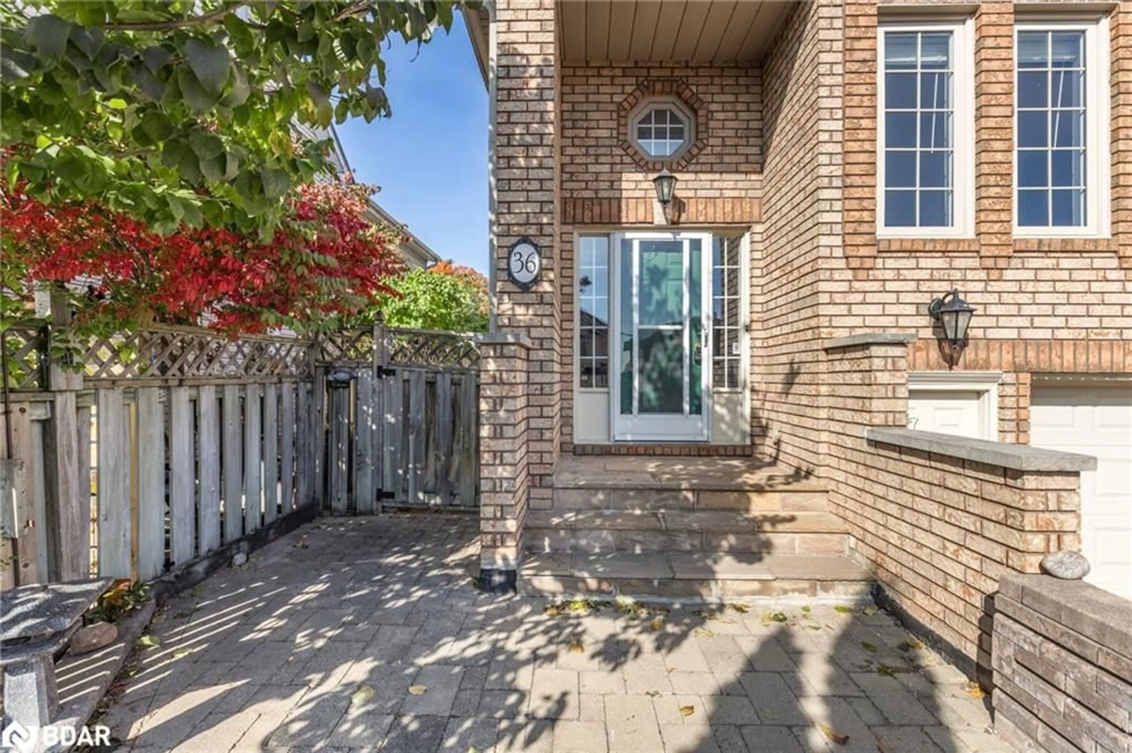 A pic from exterior of the house or condo, the fenced backyard for 36 Kempenfelt Dr, Barrie Ontario L4M 1B9