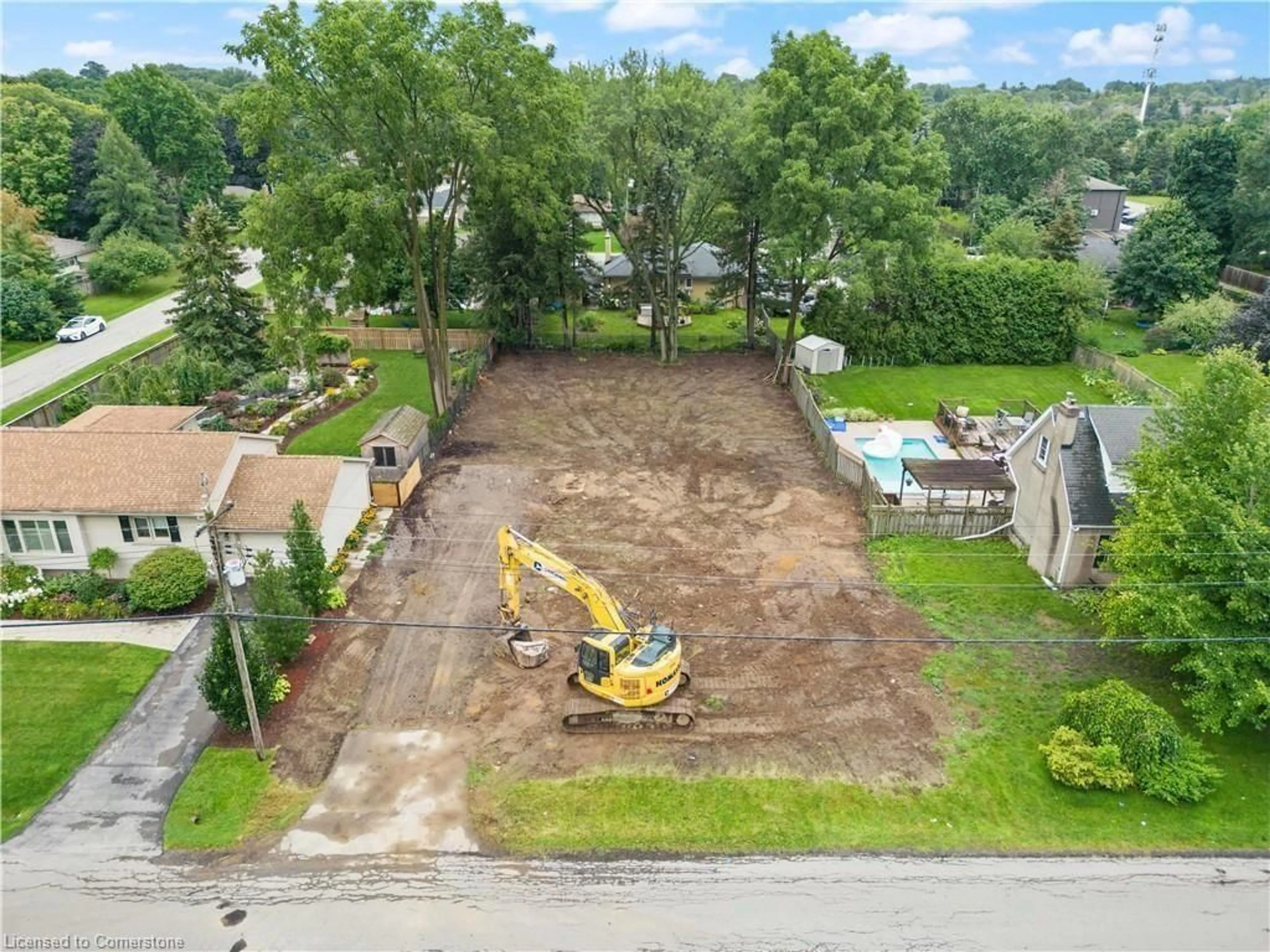 Frontside or backside of a home, the fenced backyard for 28 Calvin St, Ancaster Ontario L9G 2G3