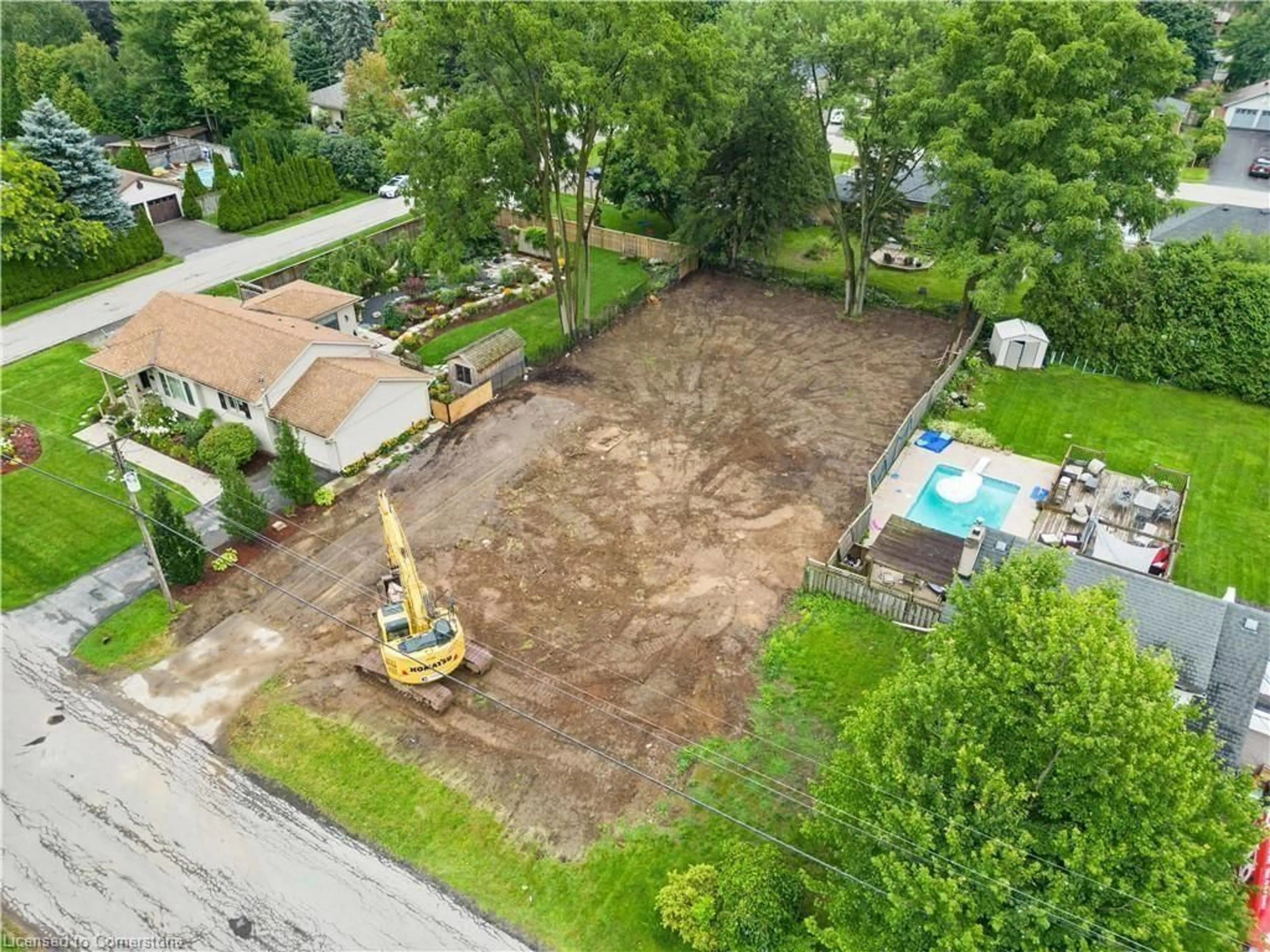 Frontside or backside of a home, the fenced backyard for 28 Calvin St, Ancaster Ontario L9G 2G3