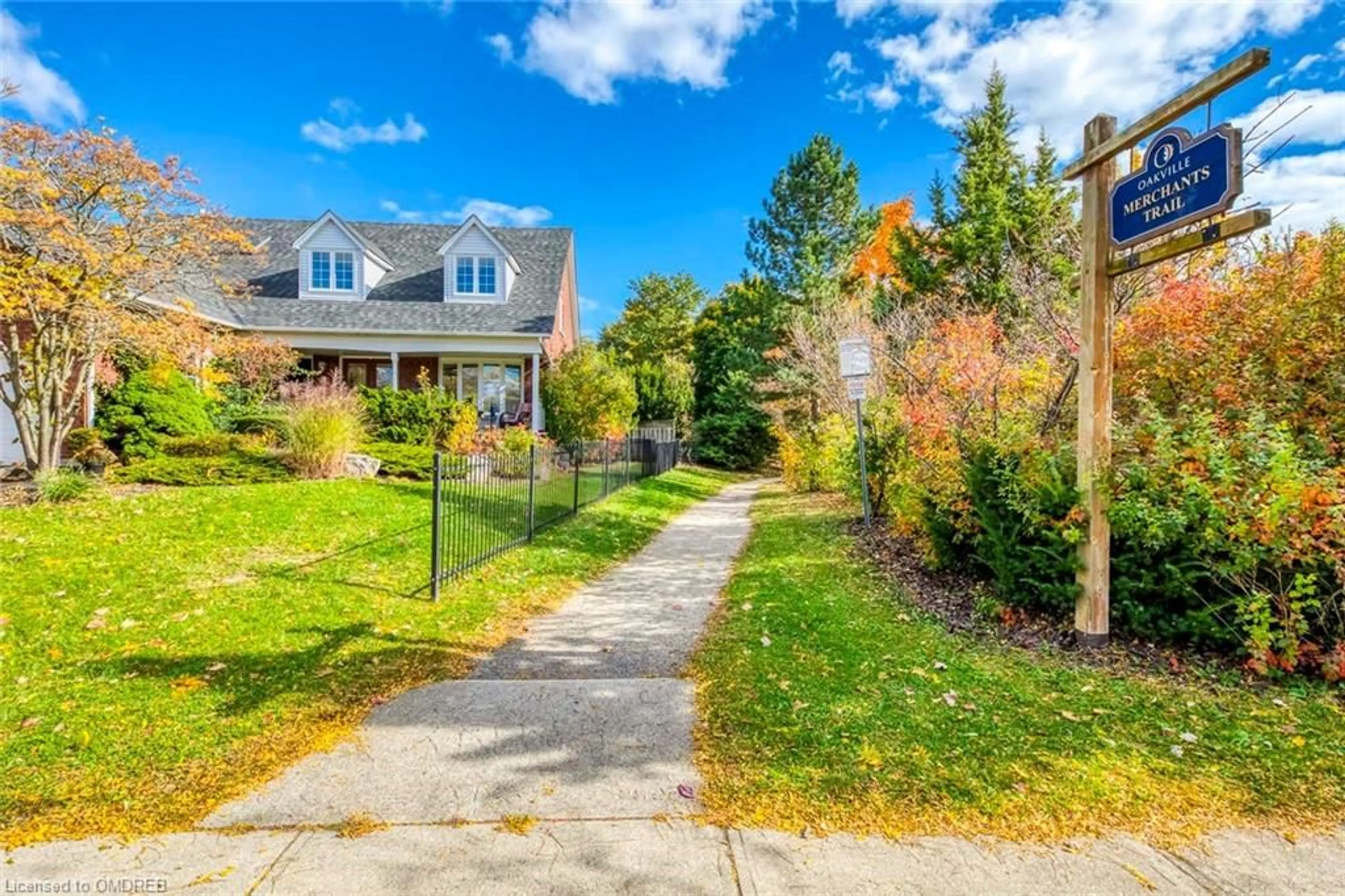 A pic from exterior of the house or condo, the fenced backyard for 1457 Postmaster Dr, Oakville Ontario L6M 2Z4