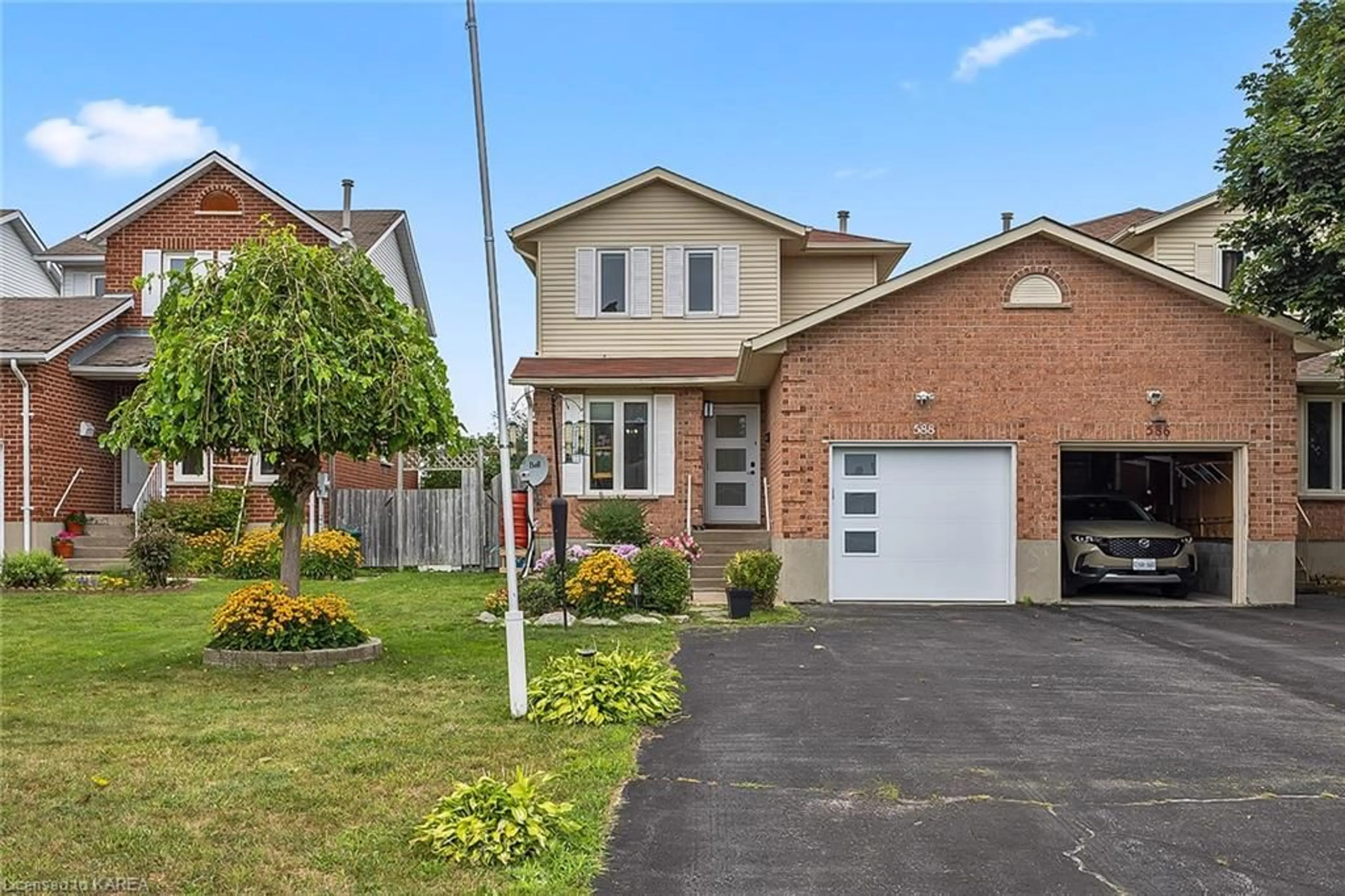 Home with brick exterior material for 588 Whistler Terr, Kingston Ontario K7M 8K4