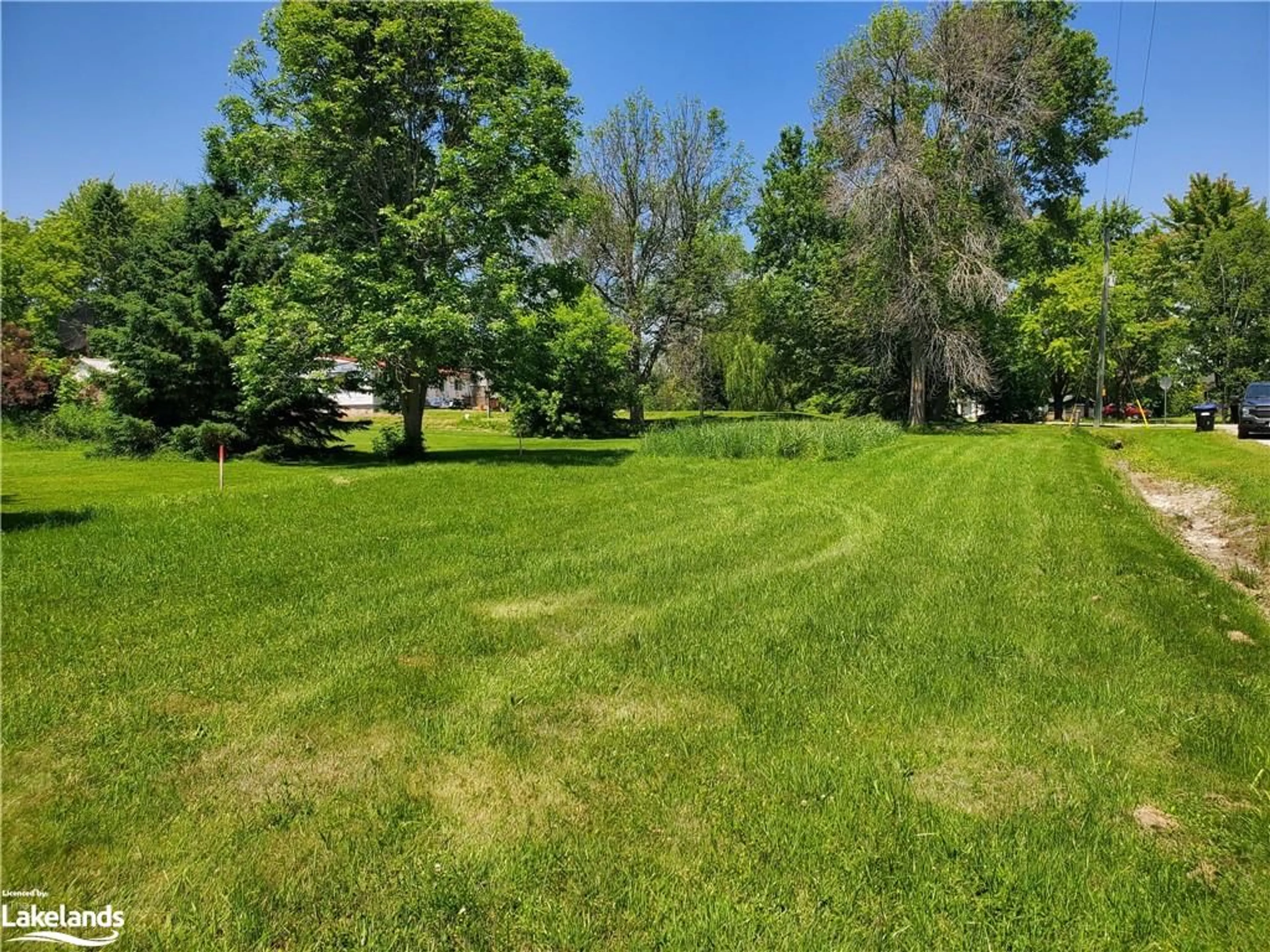 A pic from exterior of the house or condo, the fenced backyard for 4138 Fountain Dr, Ramara Ontario L3V 6H7