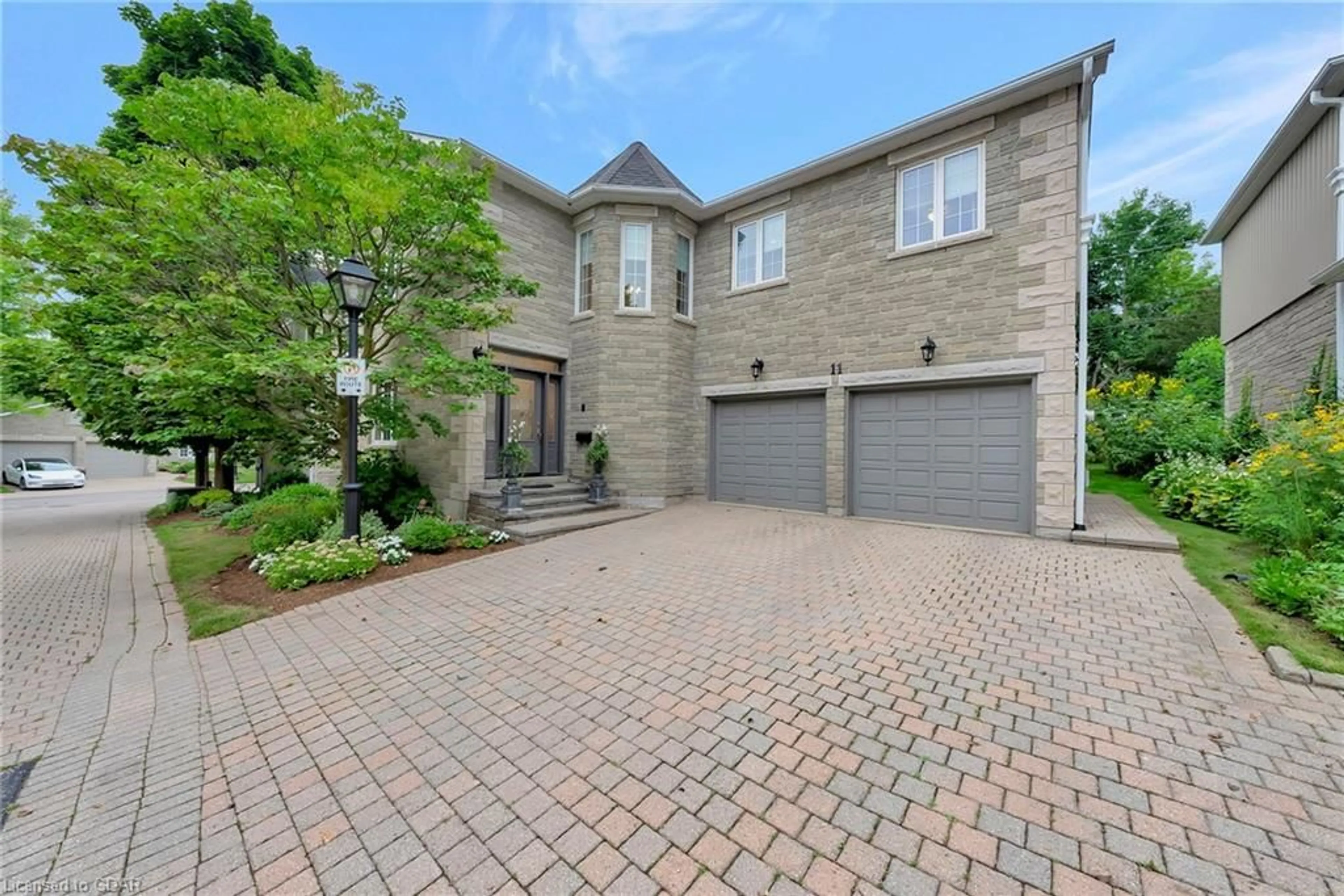 Home with brick exterior material for 25 Manor Park Cres #11, Guelph Ontario N1G 1A2