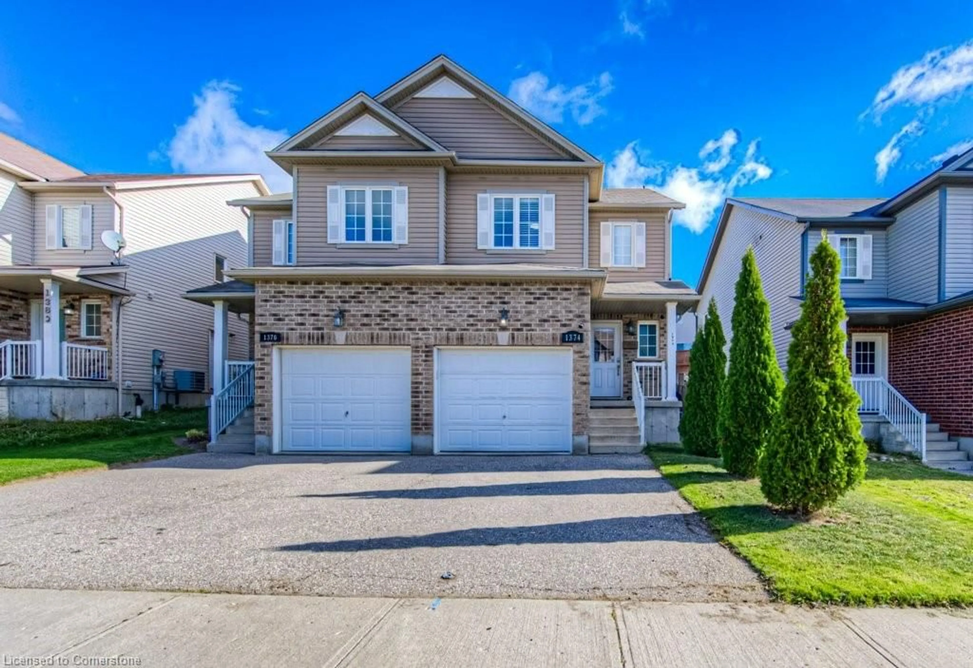 Frontside or backside of a home, the street view for 1374 Countrystone Dr, Kitchener Ontario N2N 3R8