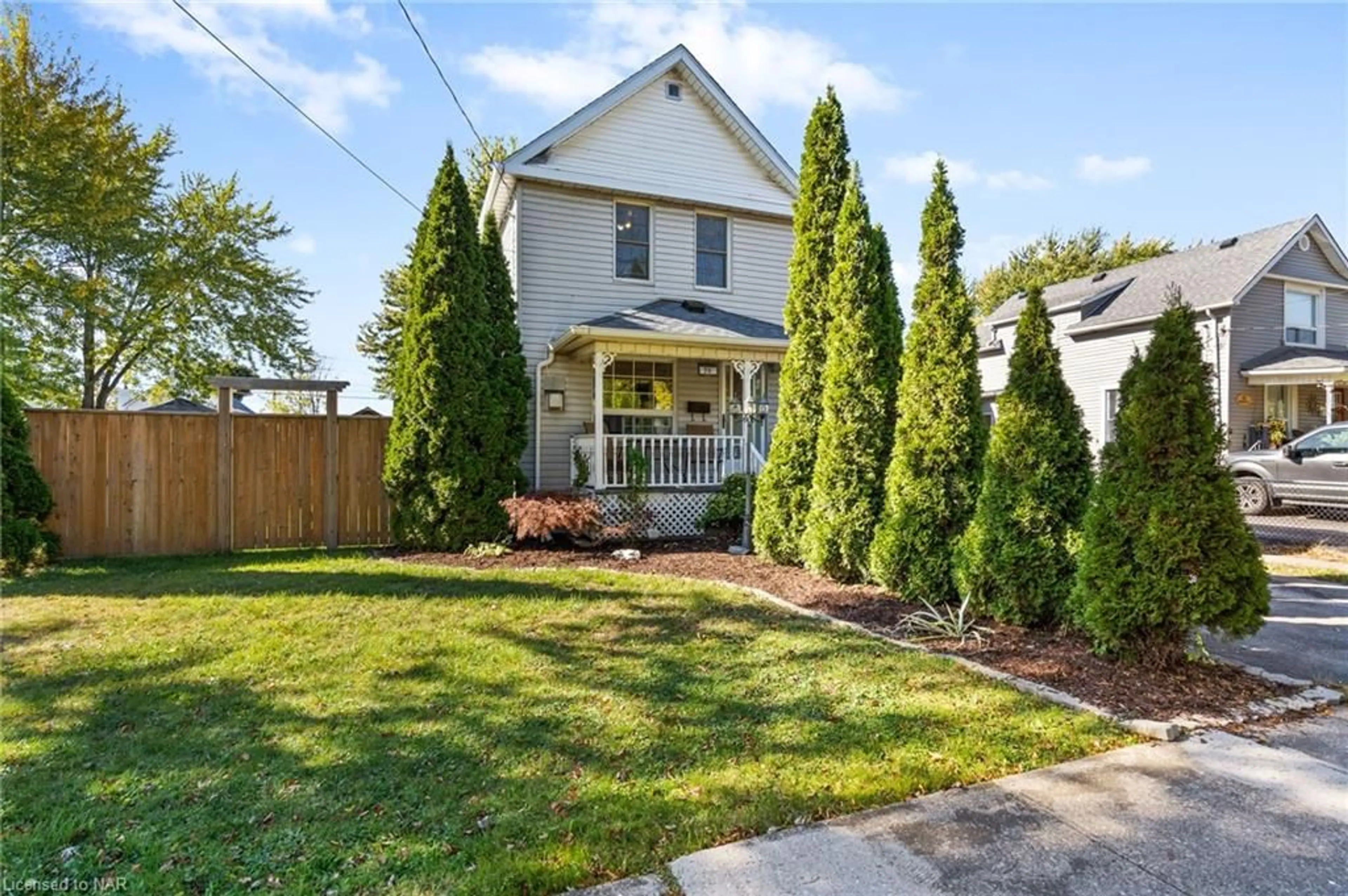 Frontside or backside of a home, the fenced backyard for 70 Beatrice St, Welland Ontario L3B 2Z3