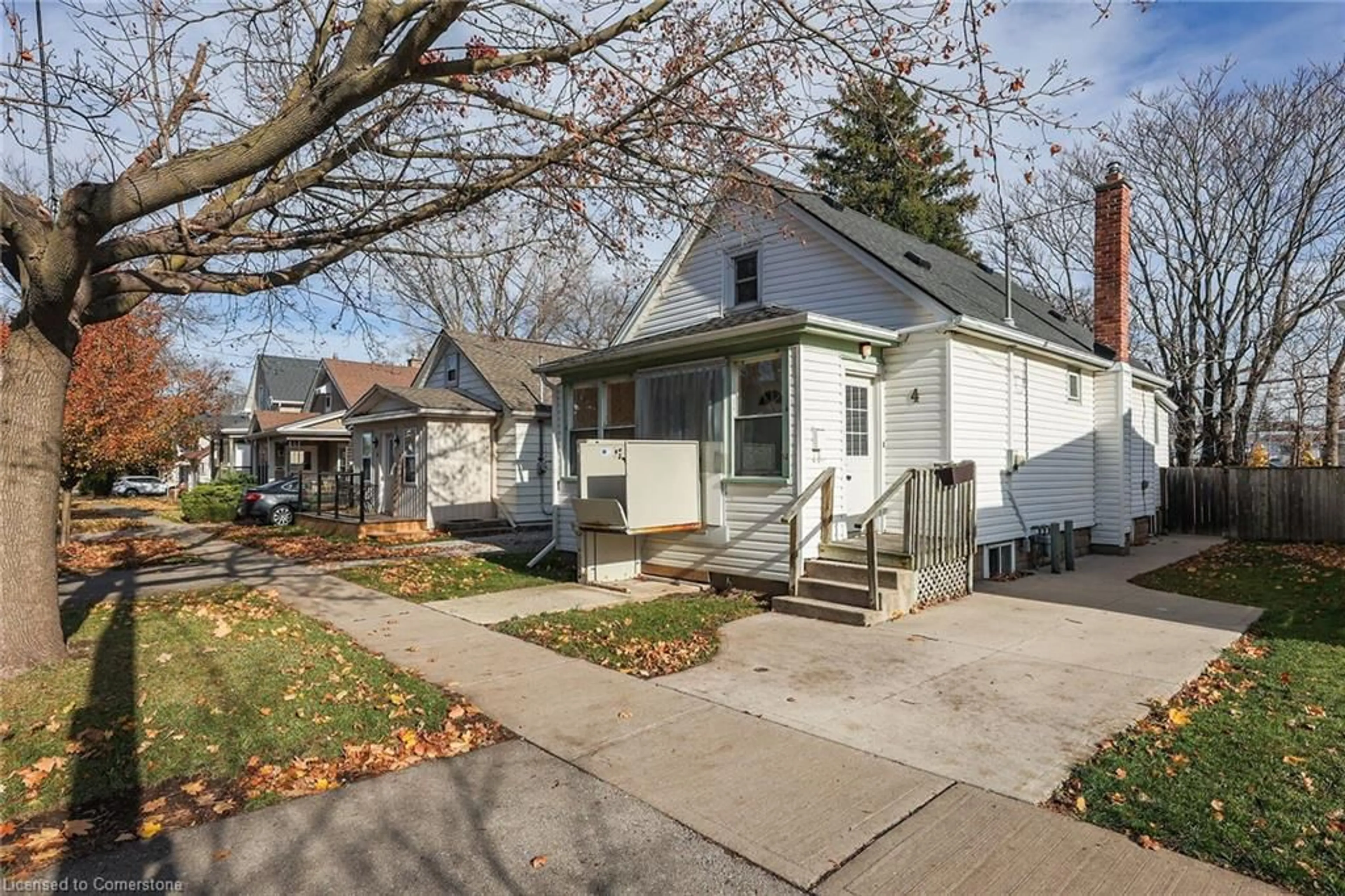 Frontside or backside of a home, the fenced backyard for 4 Mildred Ave, St. Catharines Ontario L2R 6H8