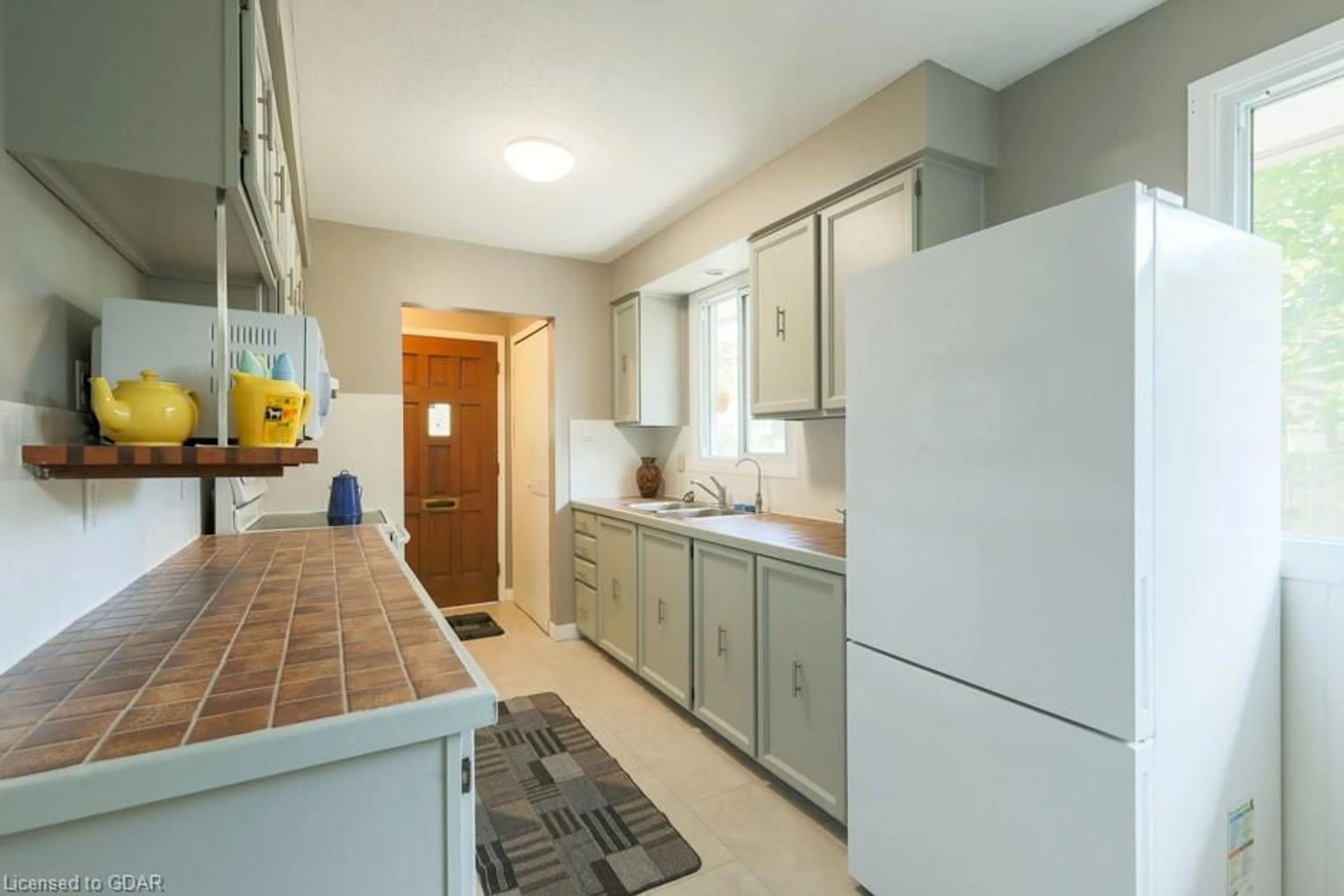 Kitchen, ceramic floors, cottage for 25 Marksam Rd, Guelph Ontario N1H 1X1