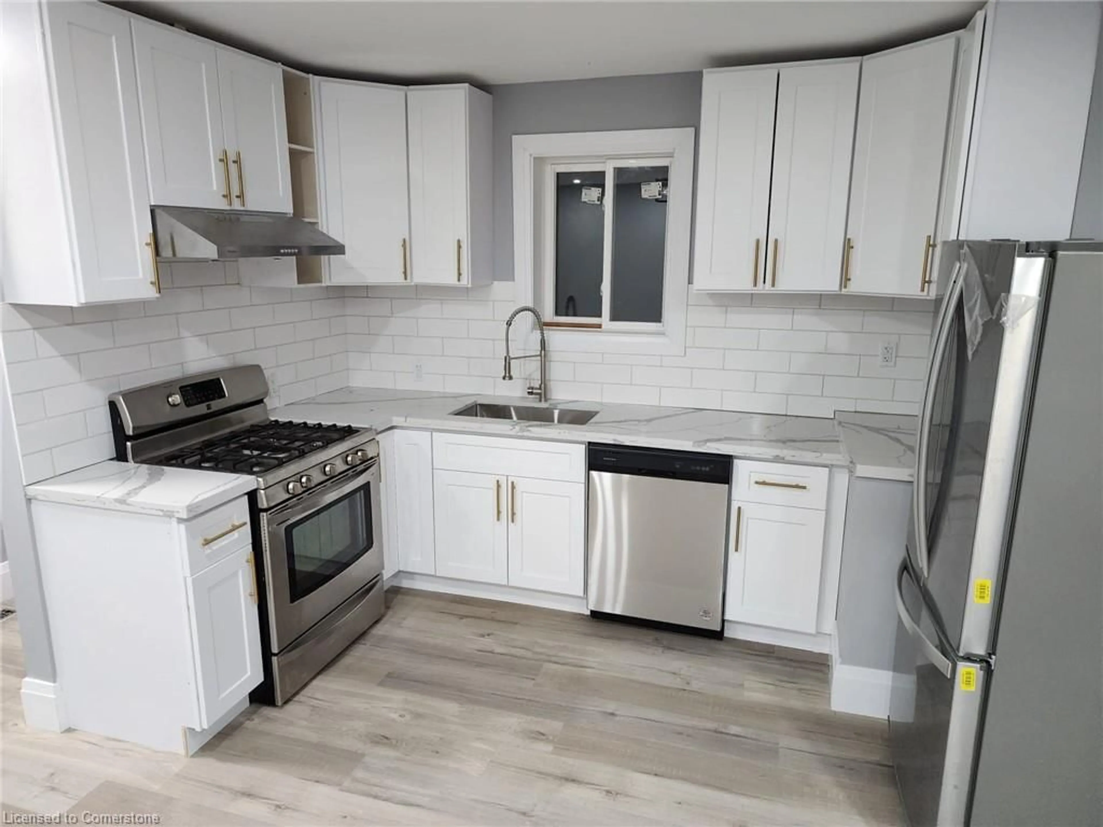 Standard kitchen, wood floors, cottage for 25 West 3rd St, Hamilton Ontario L9C 3J8