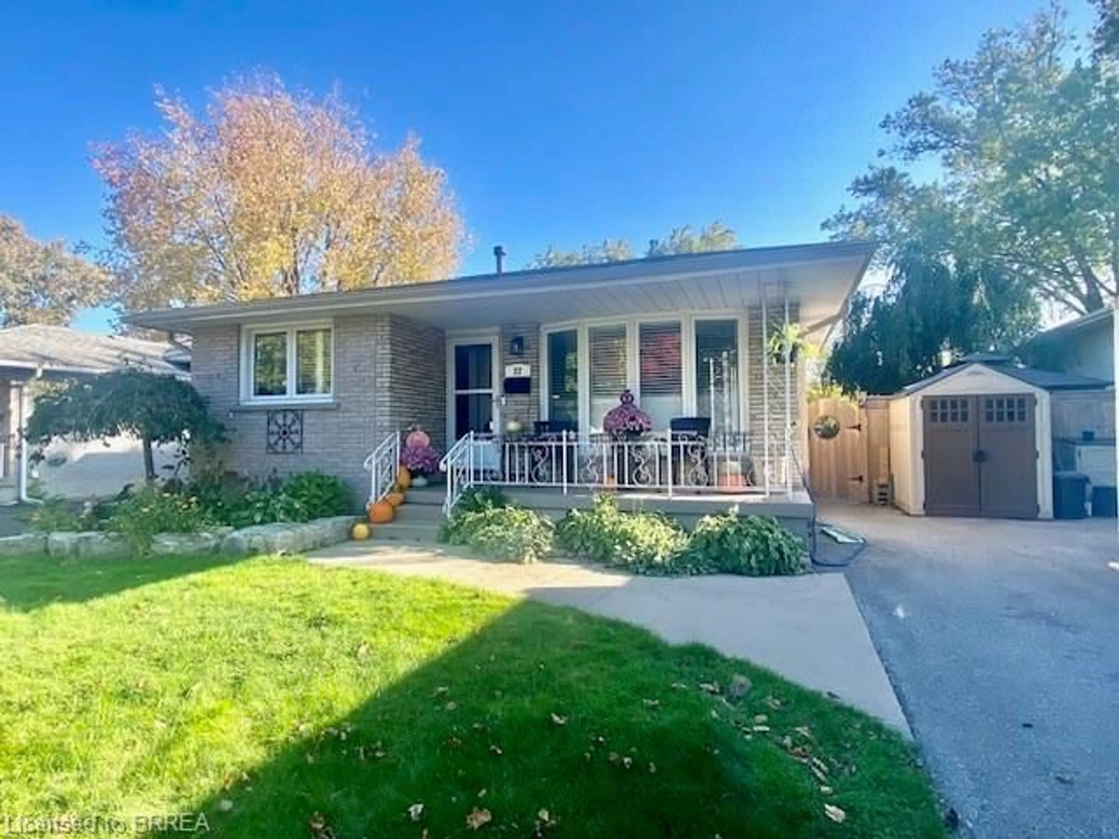 Frontside or backside of a home, the fenced backyard for 22 Walsh Crt, Brantford Ontario N3T 5X9