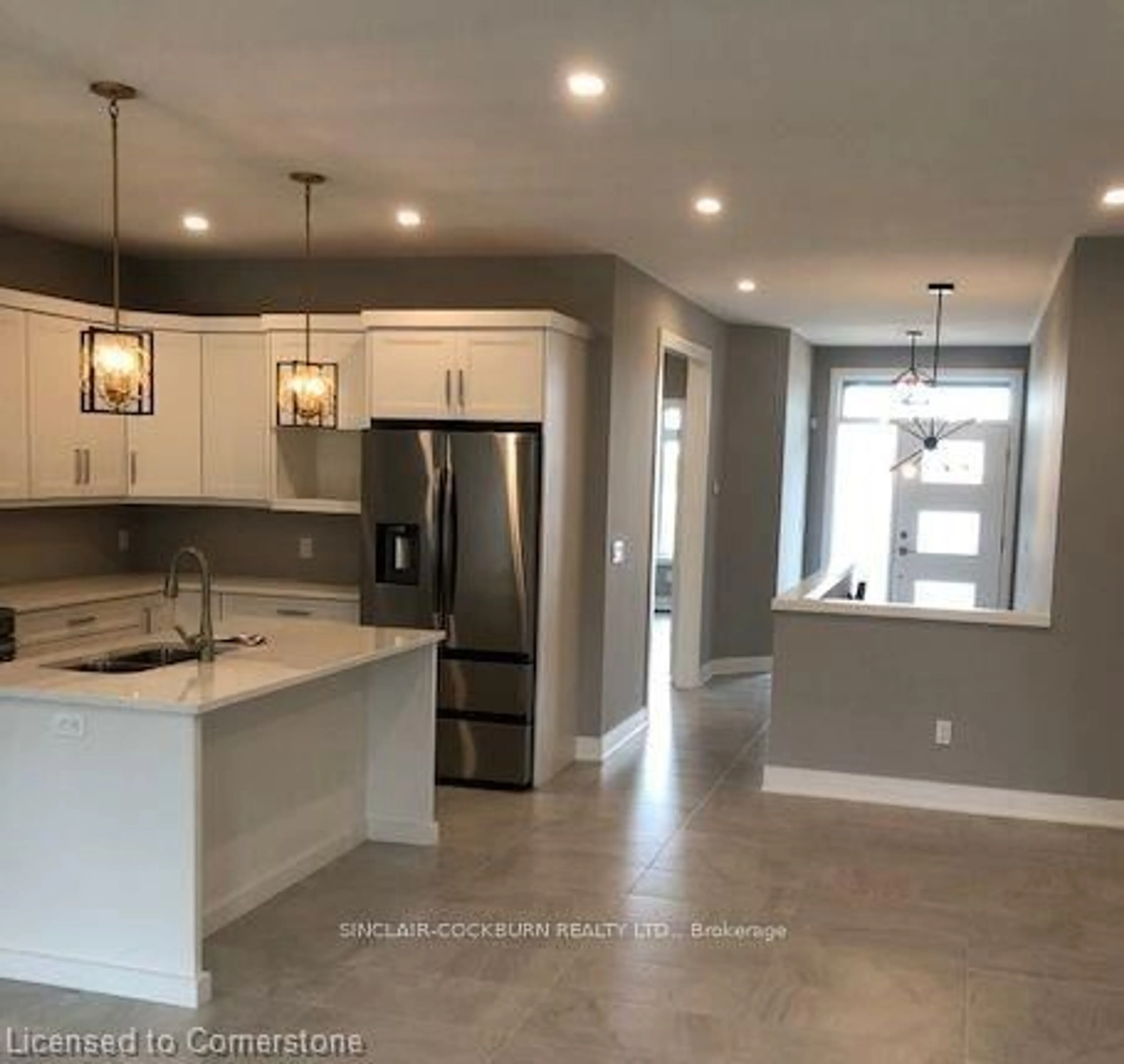 Open concept kitchen for 614 Old Course Trail, Welland Ontario L3B 0L8