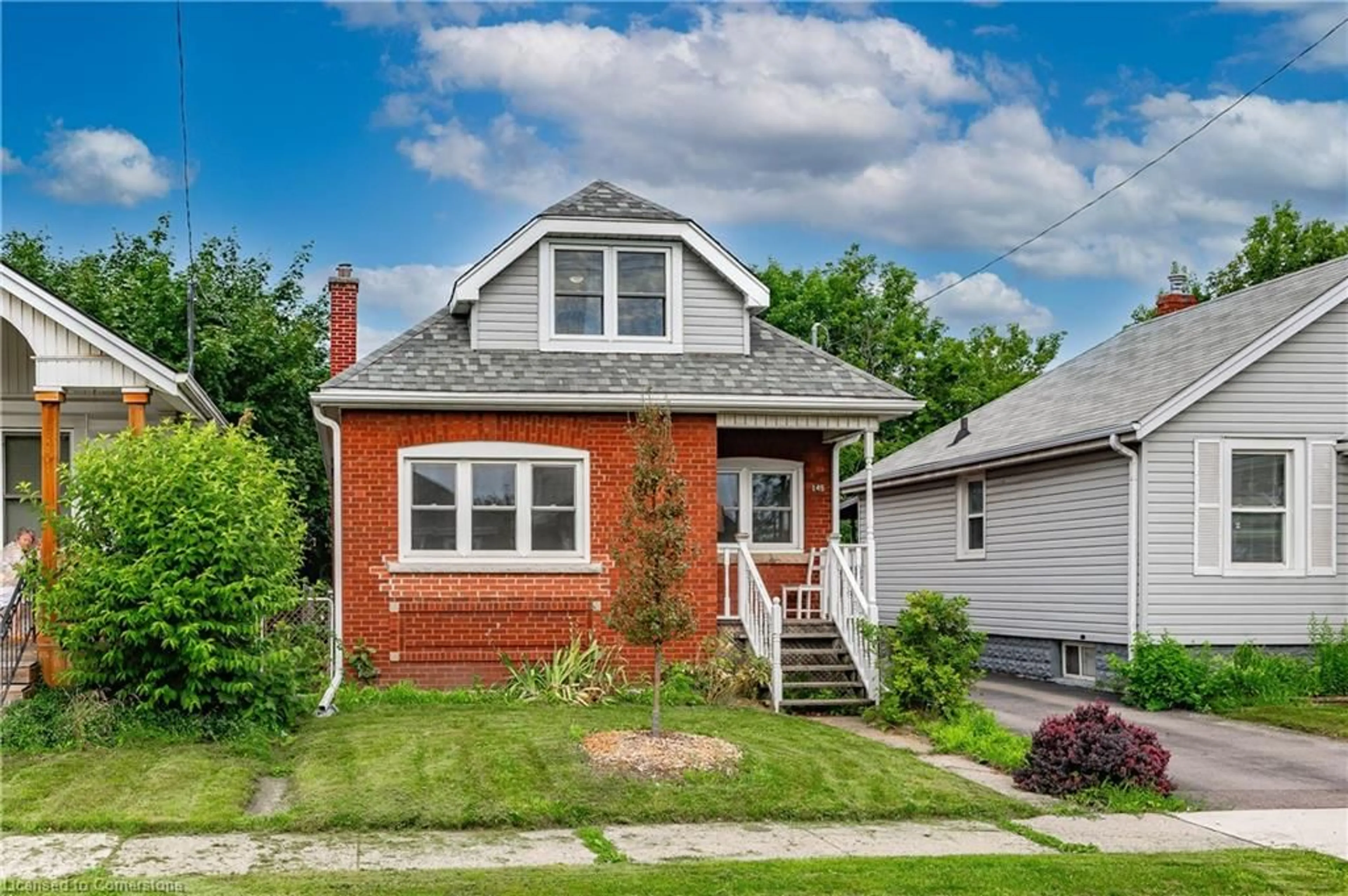 Frontside or backside of a home, cottage for 145 Weir St, Hamilton Ontario L8H 5G1