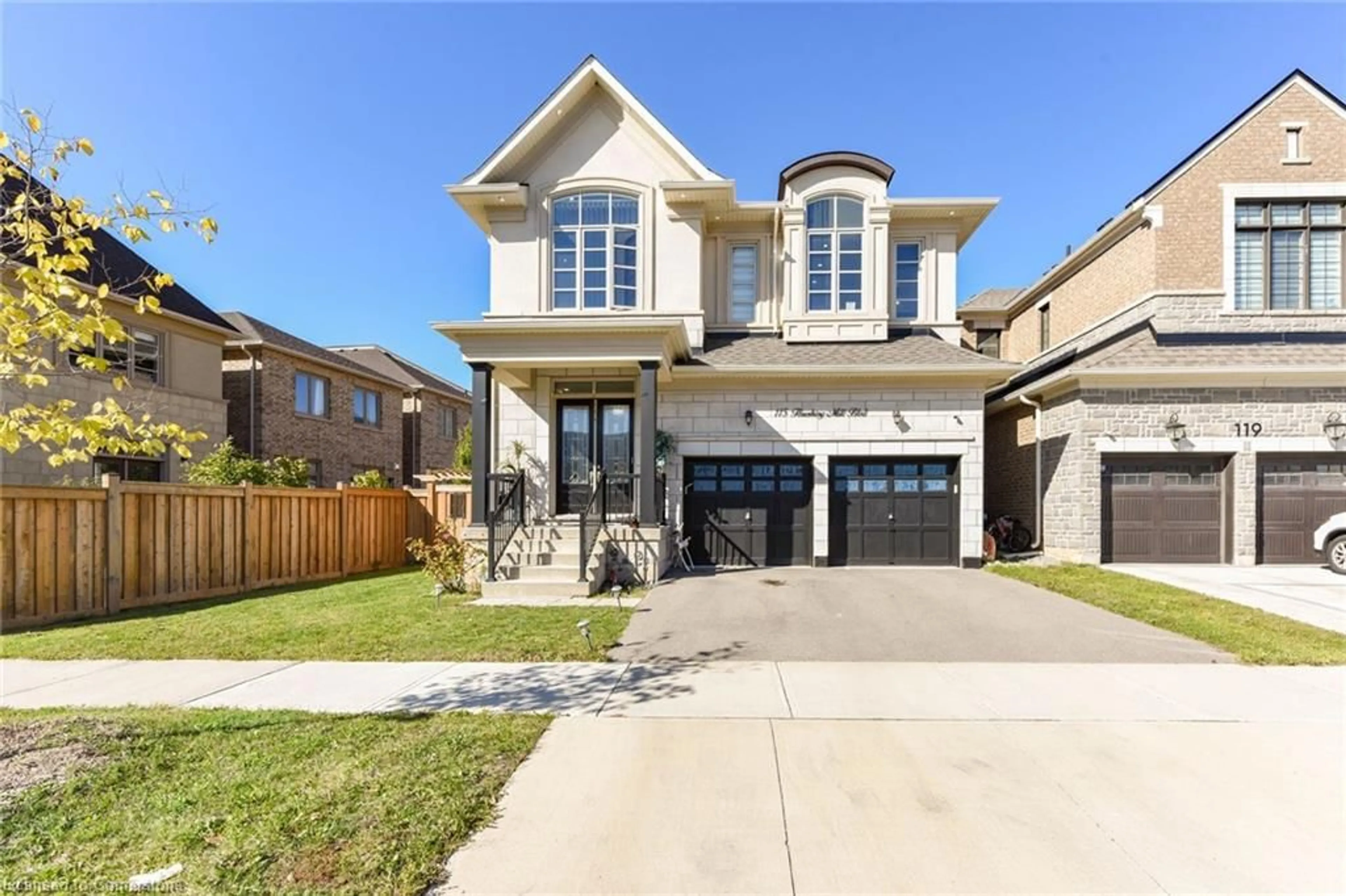 Frontside or backside of a home, the street view for 115 Threshing Mill Blvd, Oakville Ontario L6H 0V5