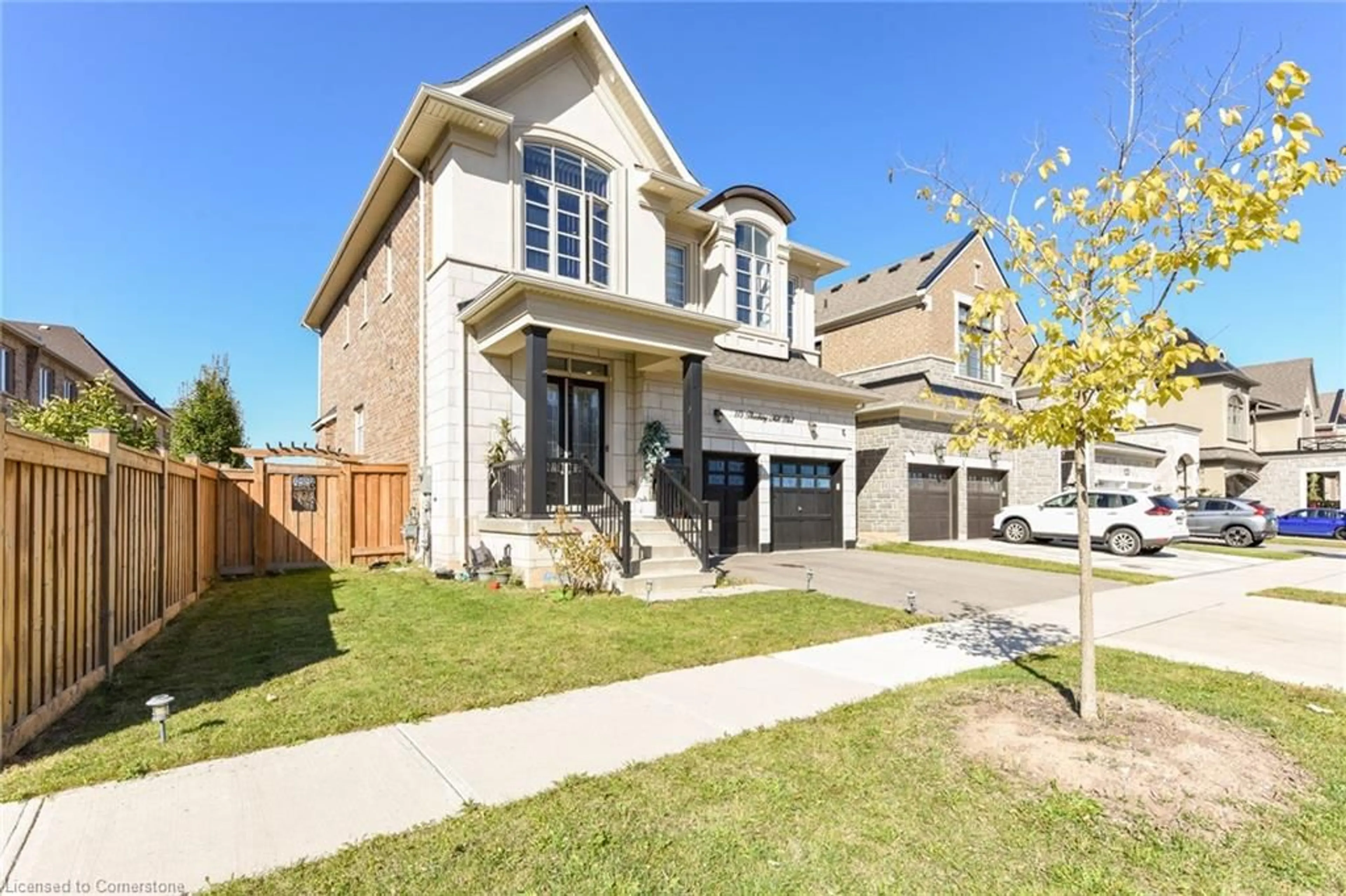 Frontside or backside of a home, the street view for 115 Threshing Mill Blvd, Oakville Ontario L6H 0V5