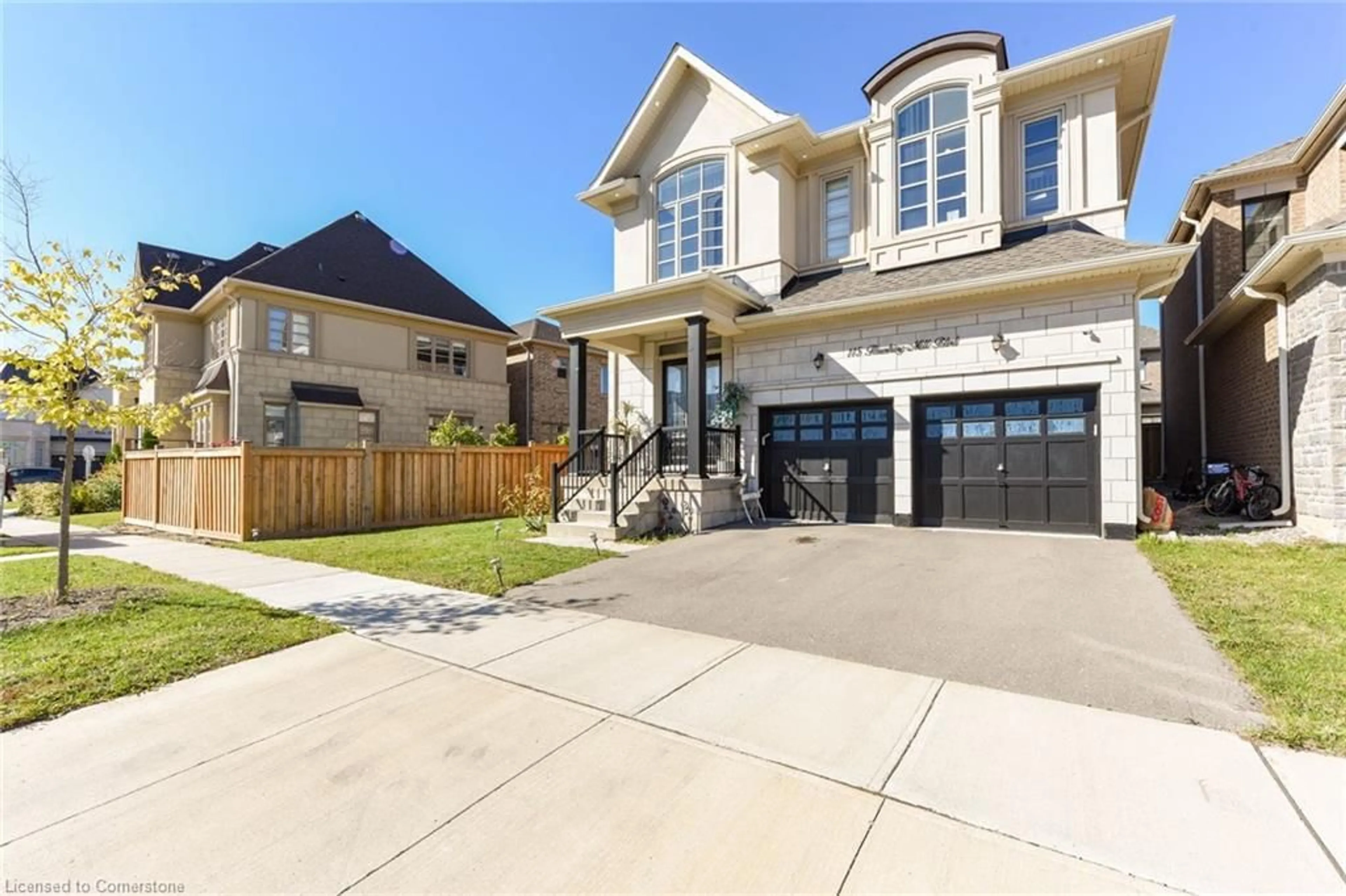 Frontside or backside of a home, the street view for 115 Threshing Mill Blvd, Oakville Ontario L6H 0V5