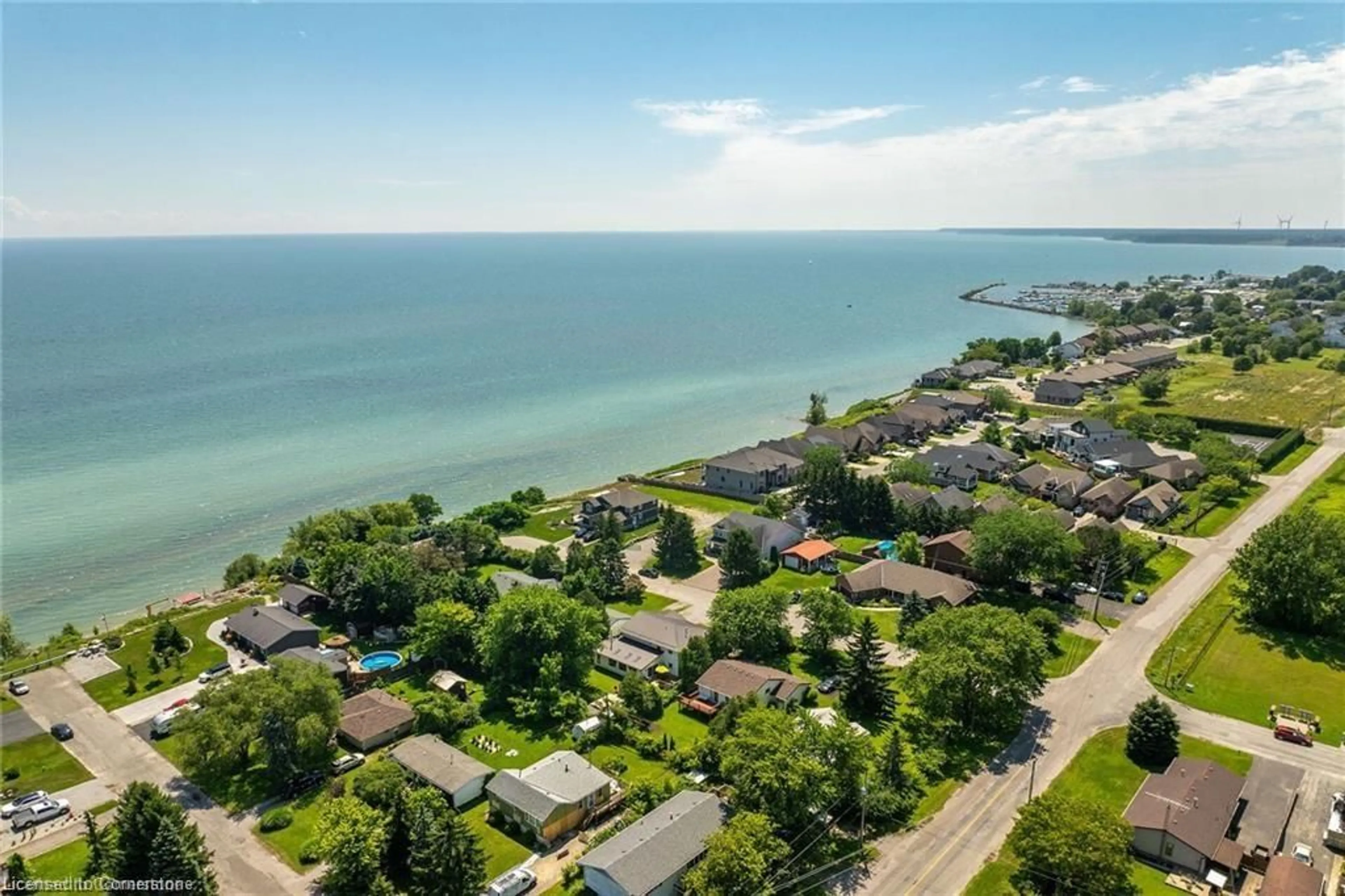 A pic from outside/outdoor area/front of a property/back of a property/a pic from drone, water/lake/river/ocean view for 24 Woodhouse Ave, Port Dover Ontario N0A 1N8