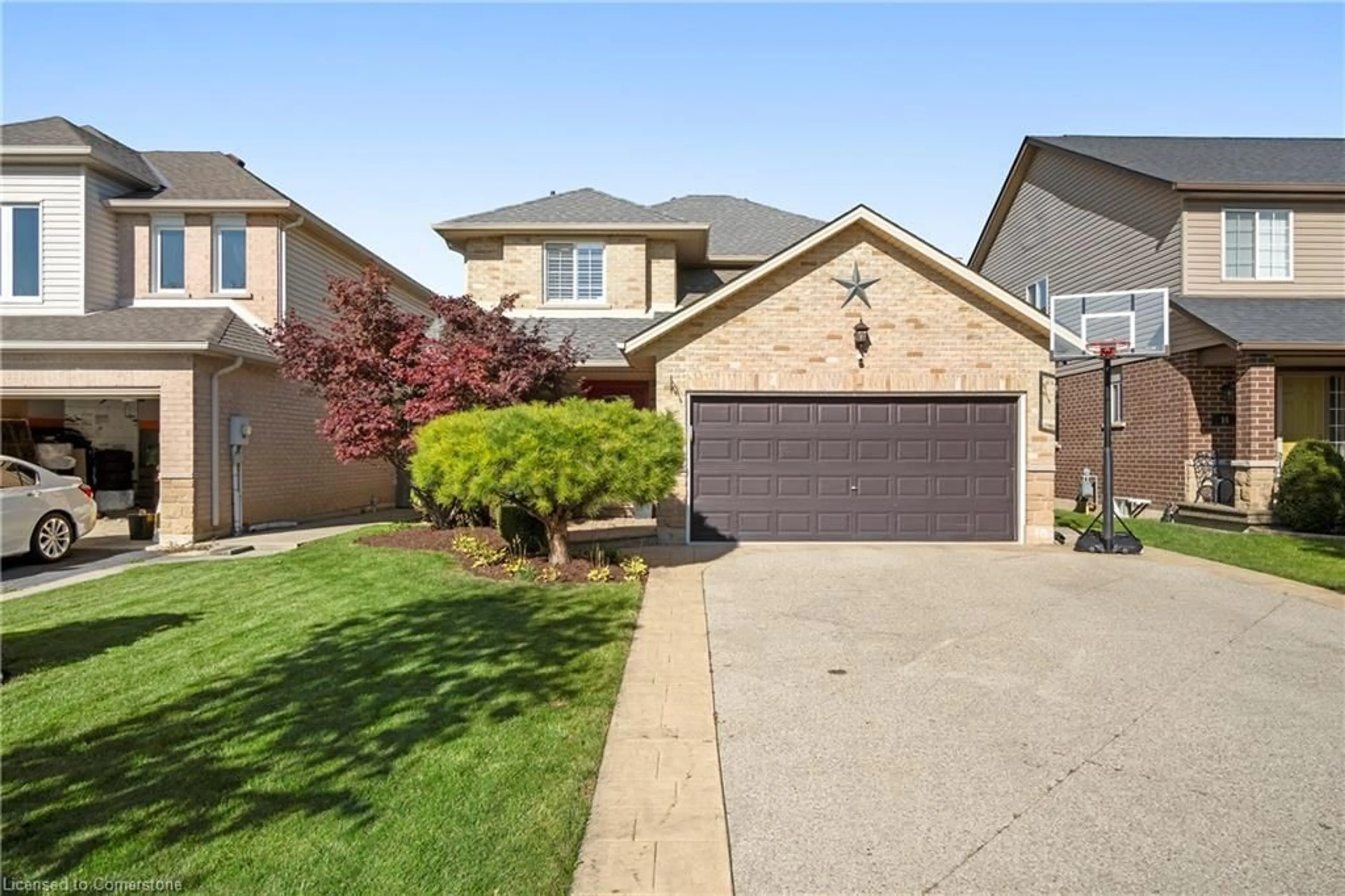 Frontside or backside of a home, the fenced backyard for 20 Midanbury Way, Mount Hope Ontario L0R 1W0