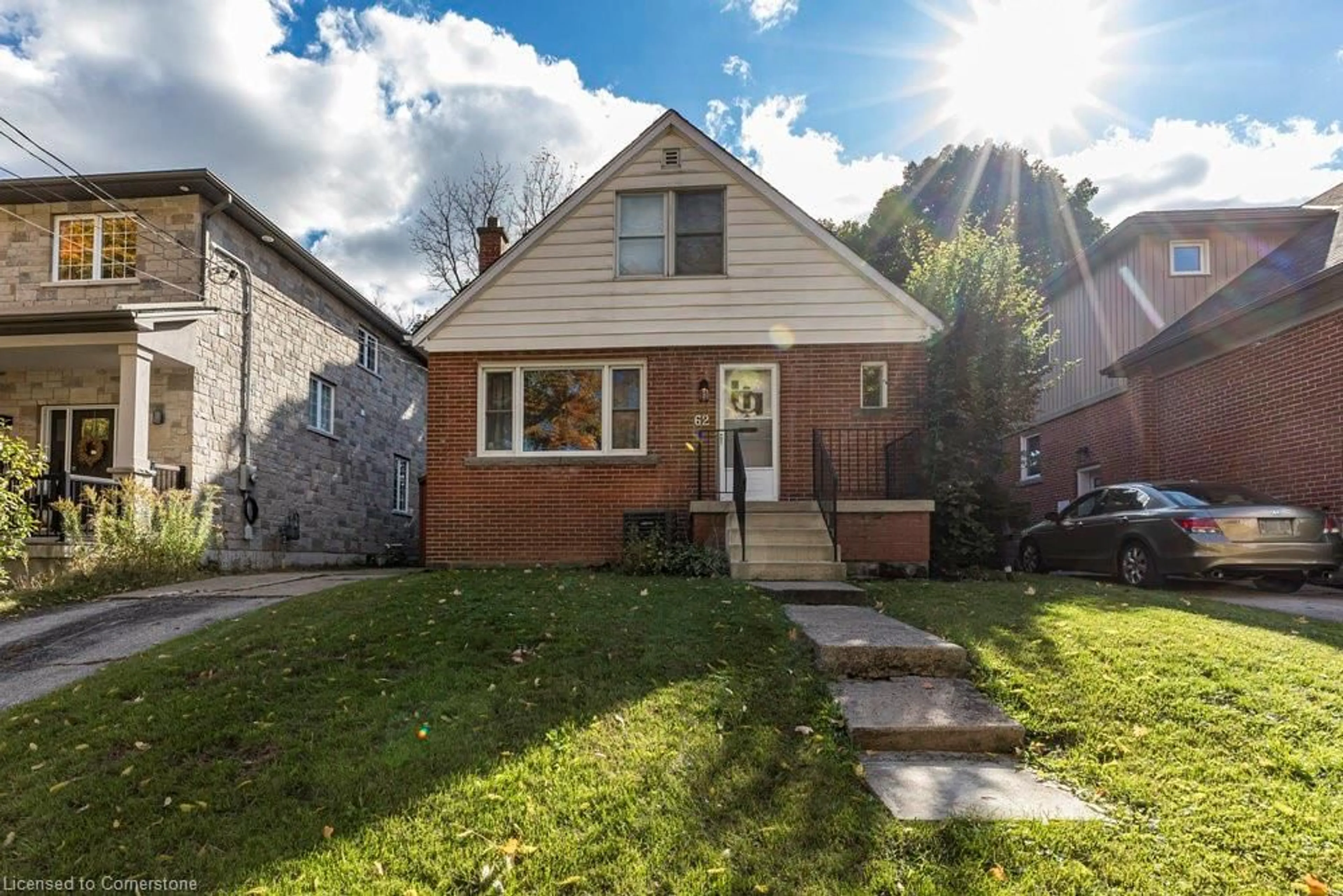 Frontside or backside of a home, the fenced backyard for 62 Alma St, Dundas Ontario L9H 2E2