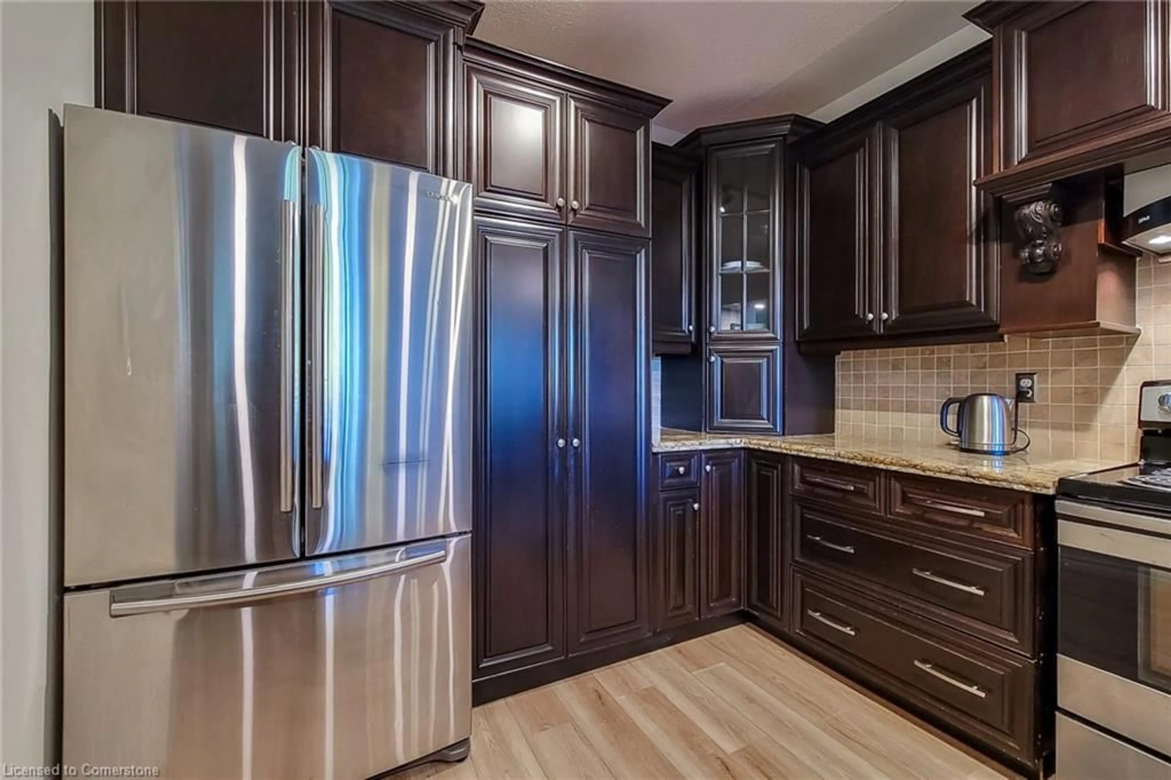 Open concept kitchen for 8111 Forest Glen Dr #102, Niagara Falls Ontario L2H 2Y7