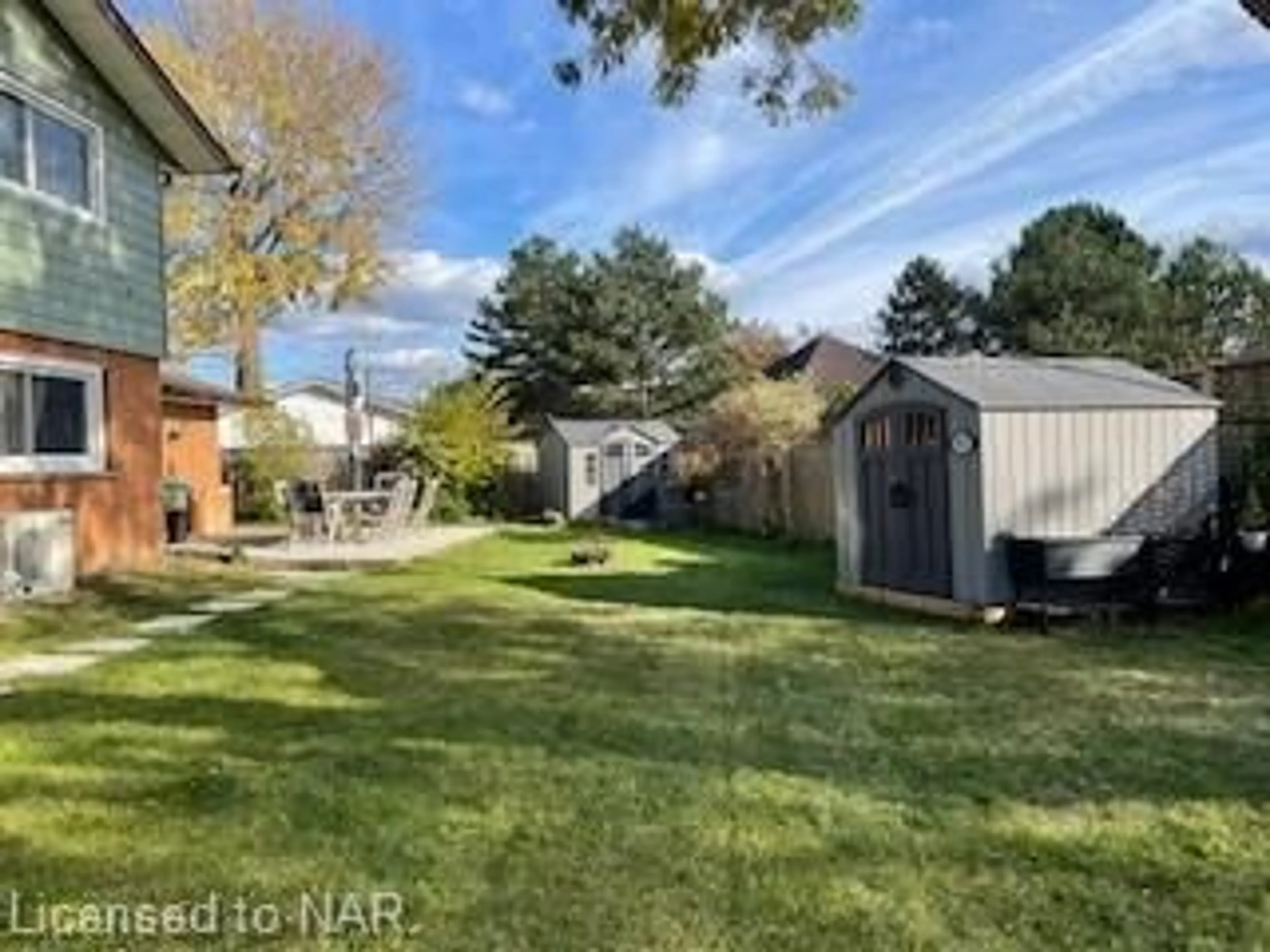 Frontside or backside of a home, the fenced backyard for 7001 Concord Cres, Niagara Falls Ontario L2G 5G7