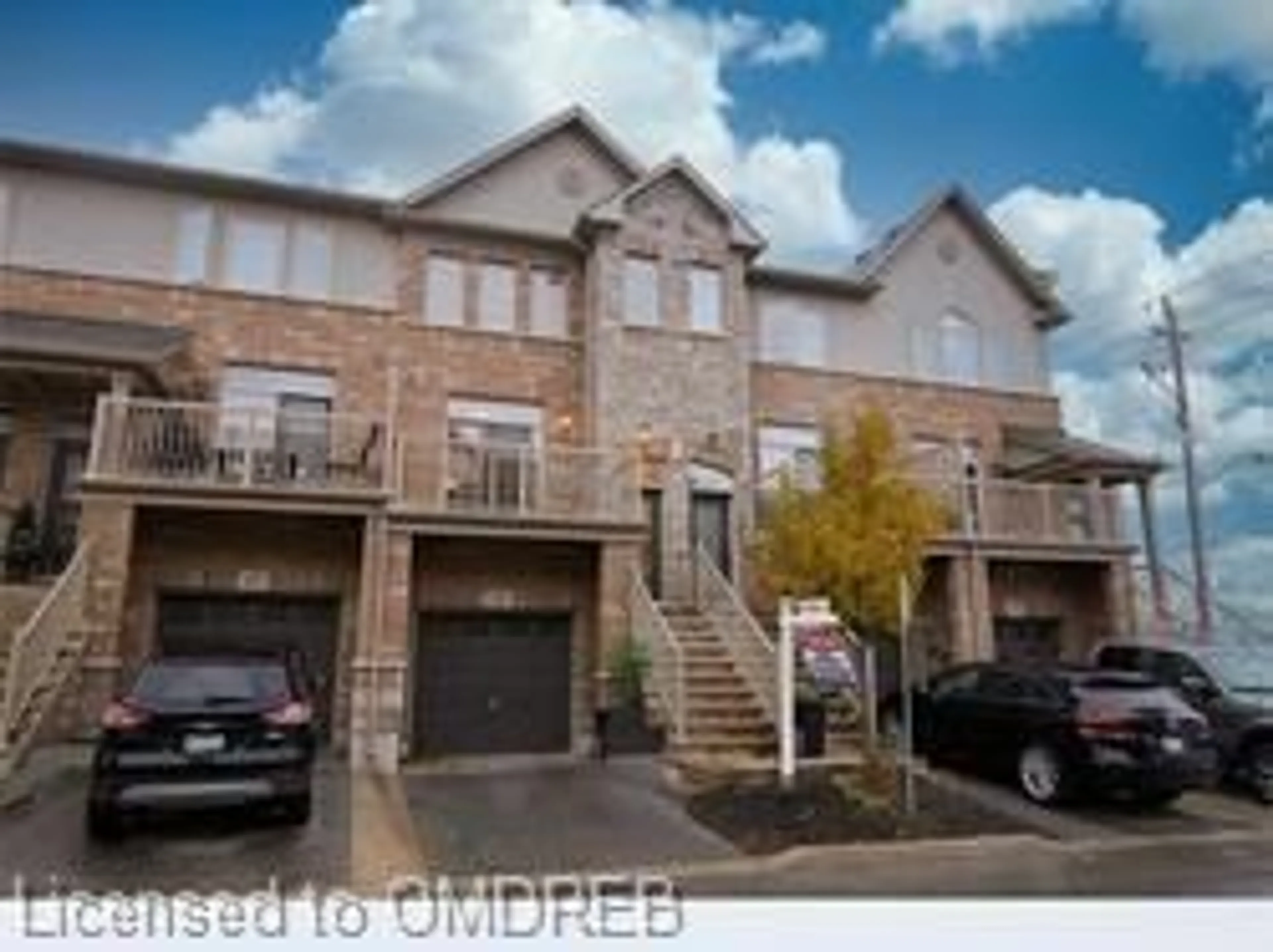 A pic from exterior of the house or condo, the street view for 541 Winston Rd #63, Grimsby Ontario L3M 0C5