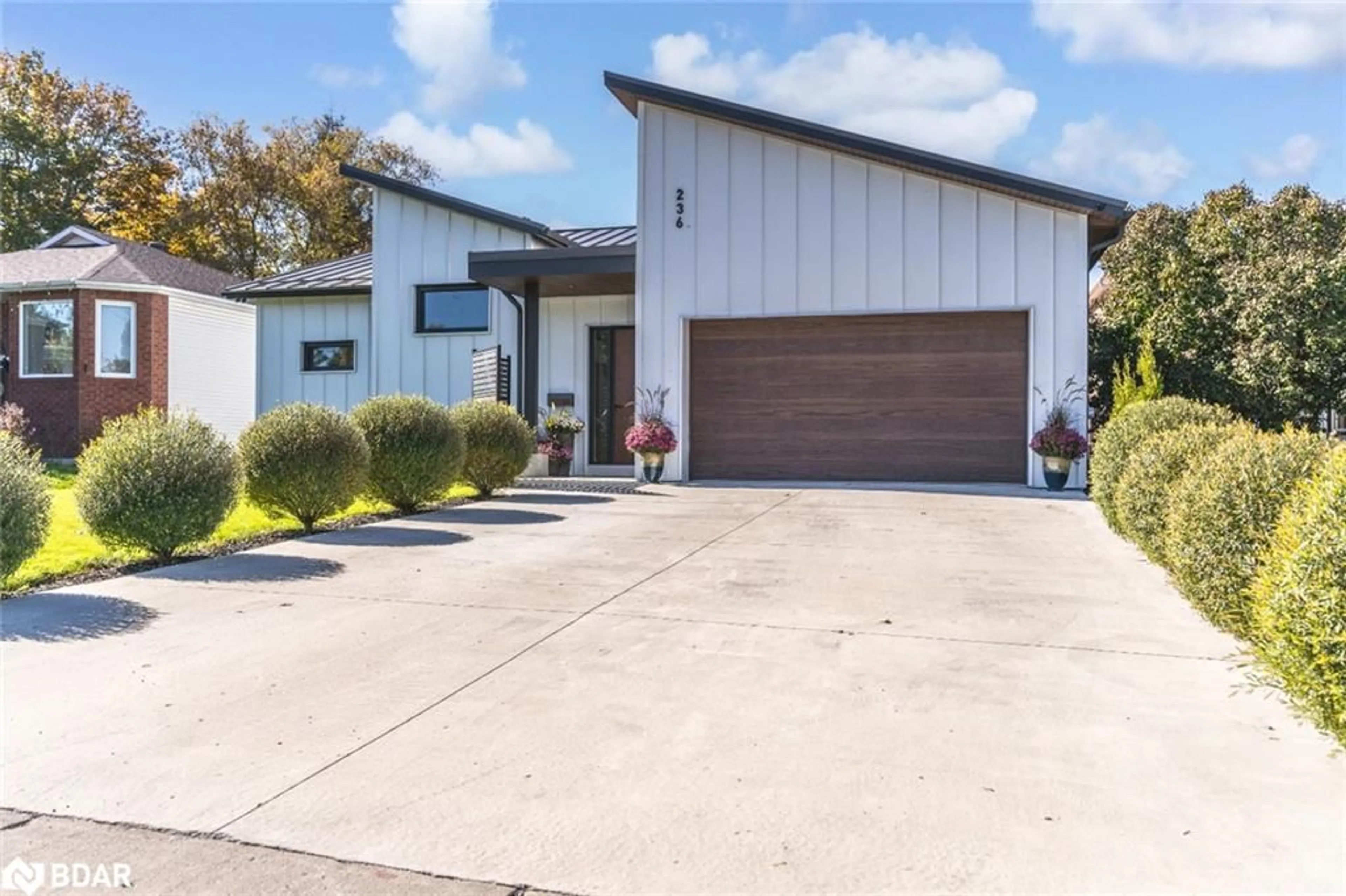 Frontside or backside of a home, the street view for 236 Cox Mill Rd, Barrie Ontario L4N 4G5