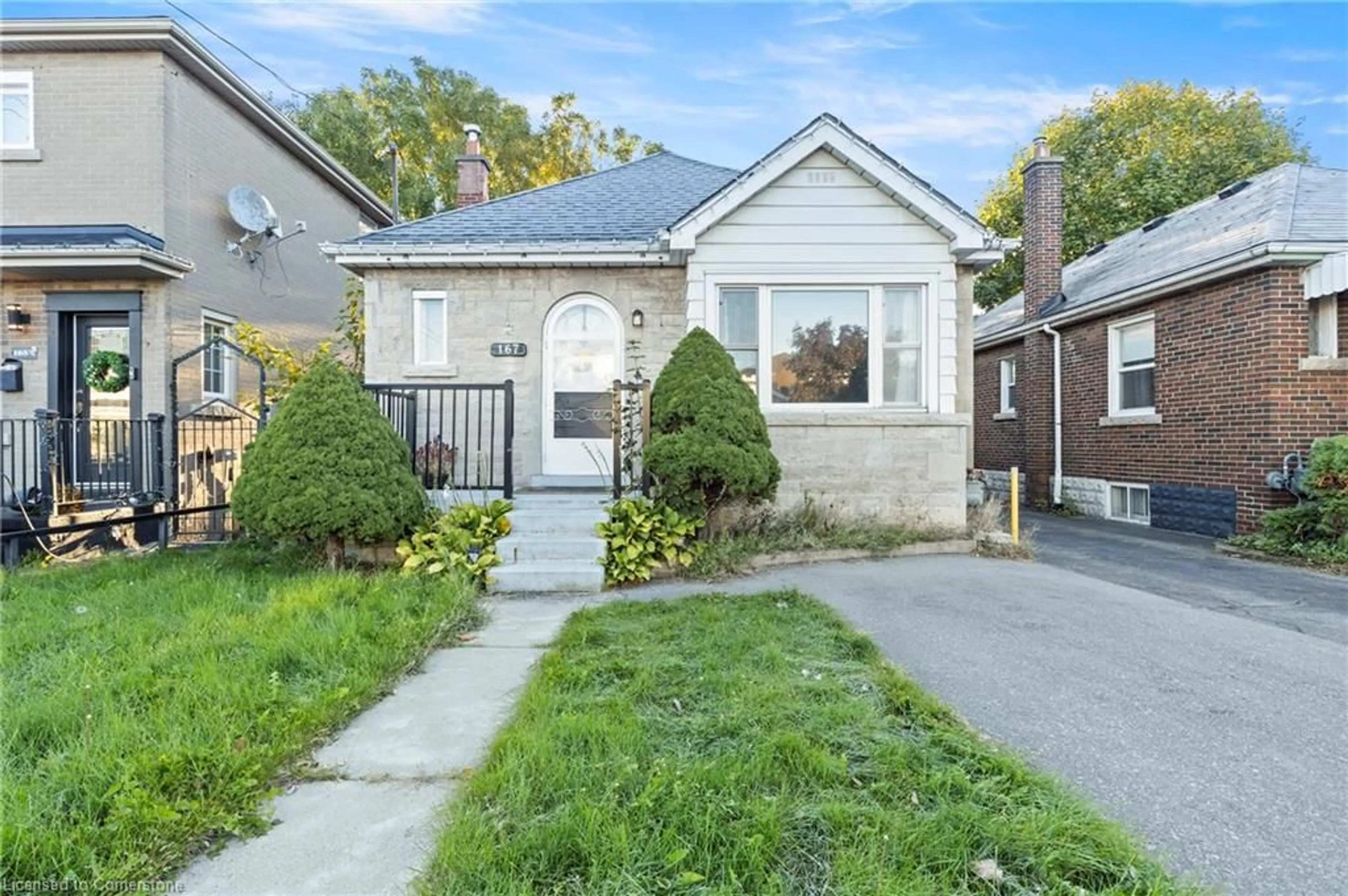 Frontside or backside of a home, the street view for 167 Kenilworth Ave, Hamilton Ontario L8K 2T5