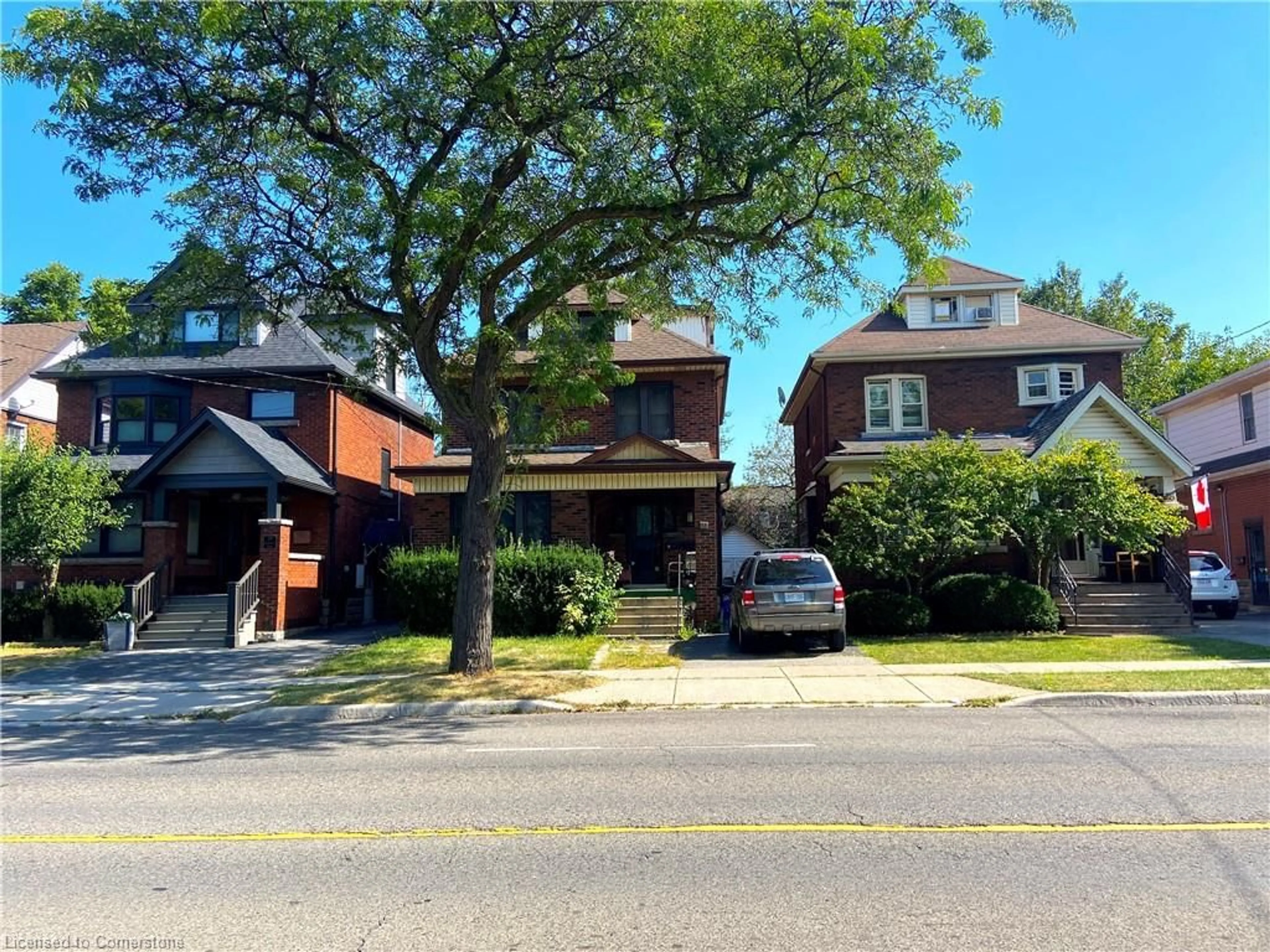 Frontside or backside of a home, the street view for 31 Ottawa St, Hamilton Ontario L8K 2C9