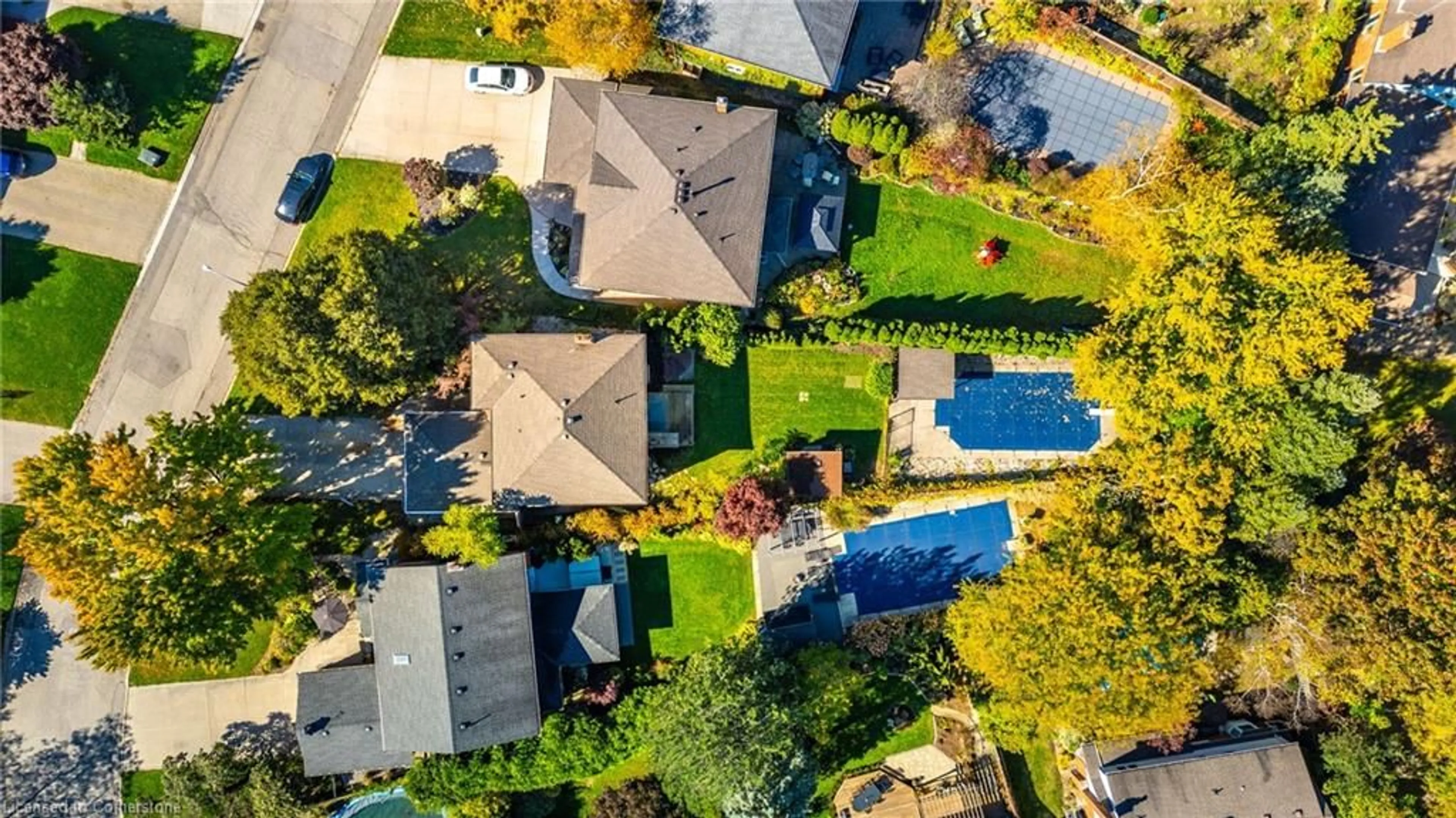 Frontside or backside of a home, the fenced backyard for 305 Woodland Dr, Ancaster Ontario L9G 4A1