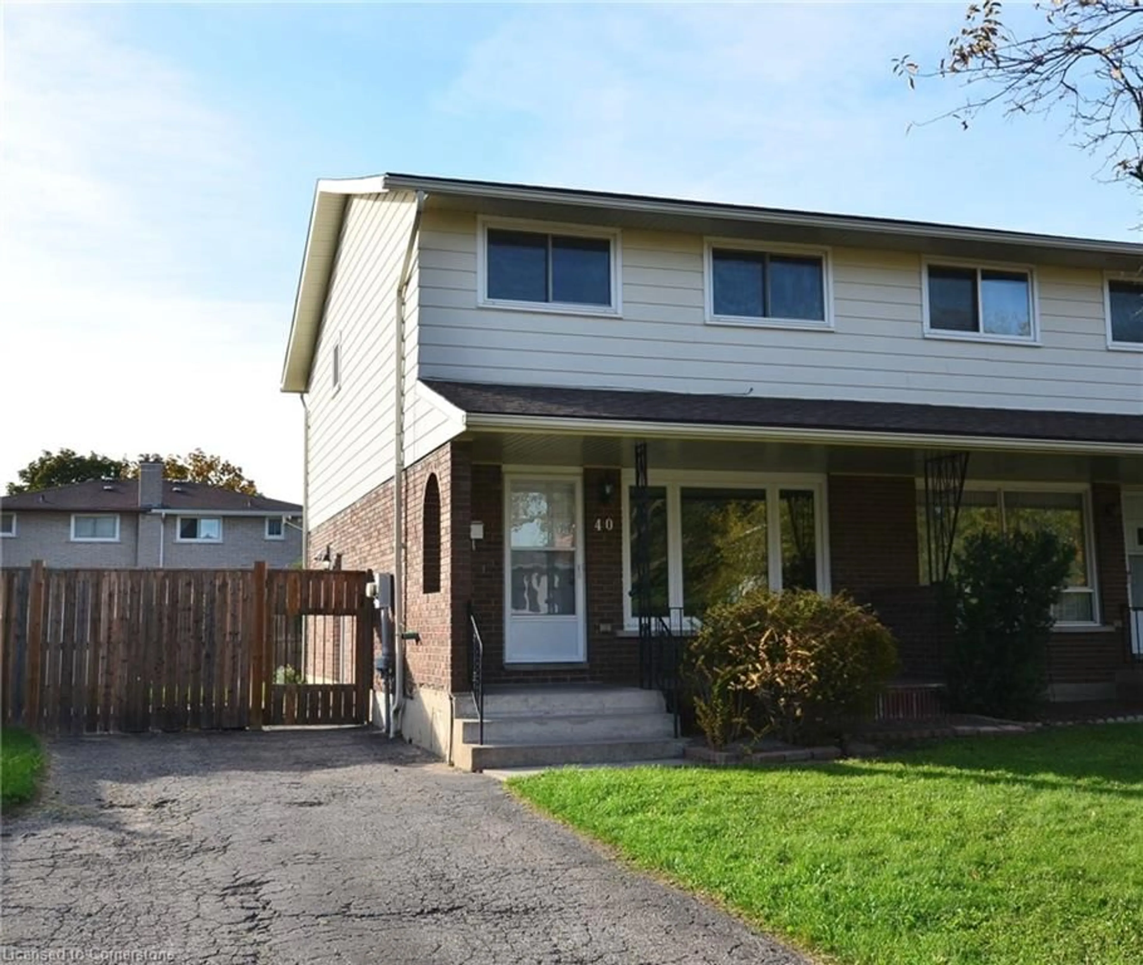 A pic from exterior of the house or condo, the fenced backyard for 40 Westfield Dr, St. Catharines Ontario L2N 5Z6