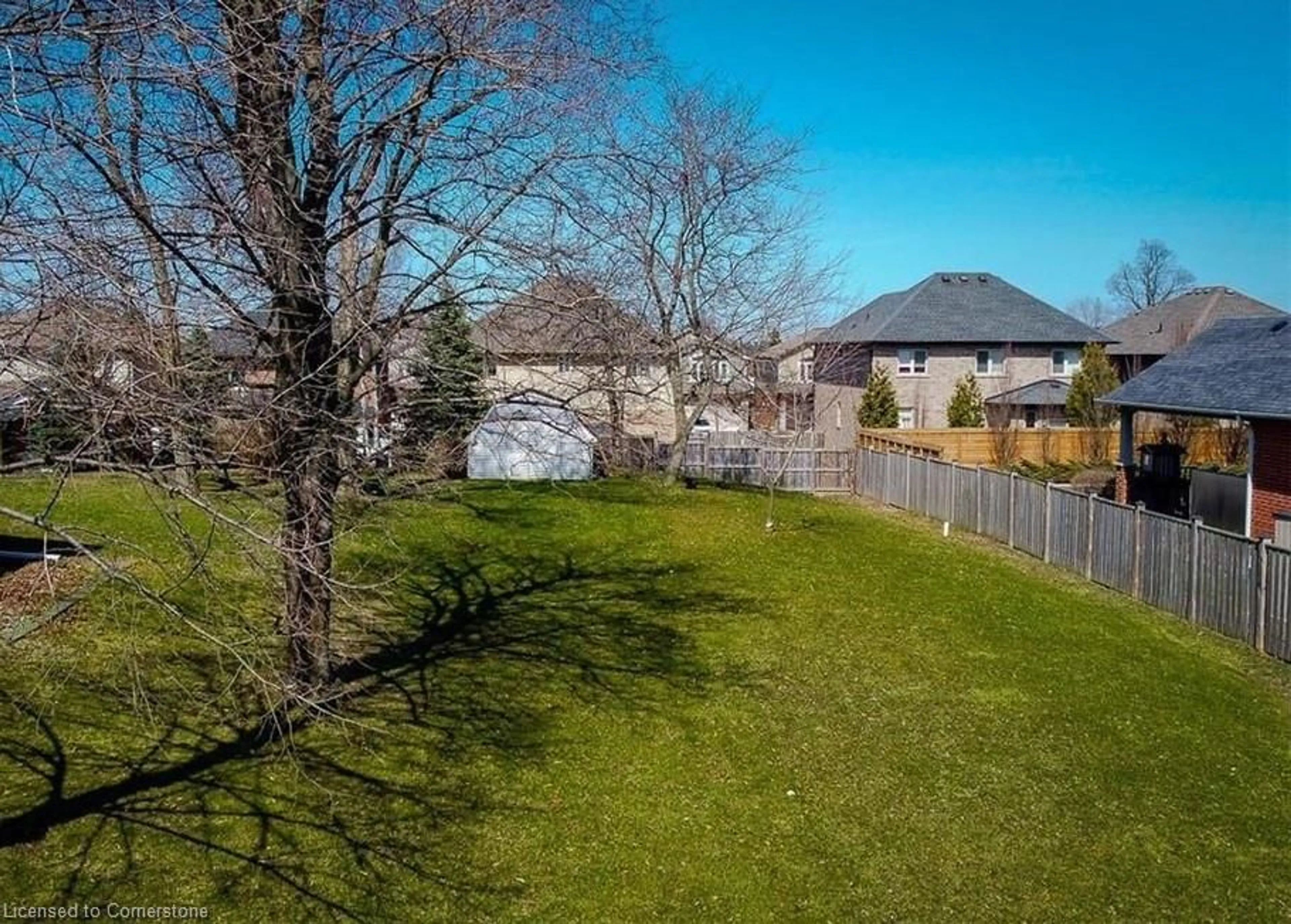 Frontside or backside of a home, the fenced backyard for 9788 Twenty Rd, Hamilton Ontario L0R 1W0