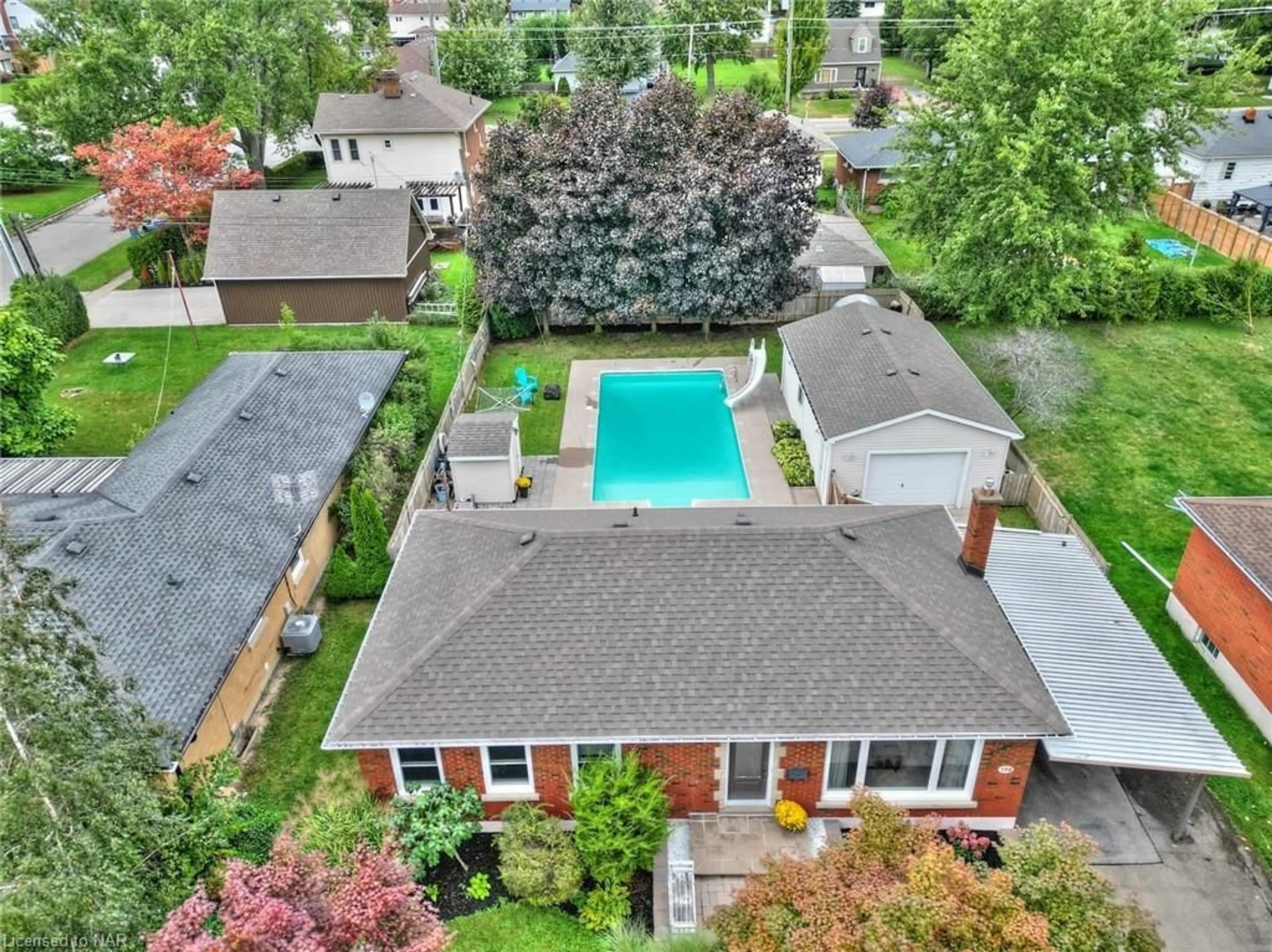 Frontside or backside of a home, the fenced backyard for 190 Price Ave, Welland Ontario L3C 3Y6