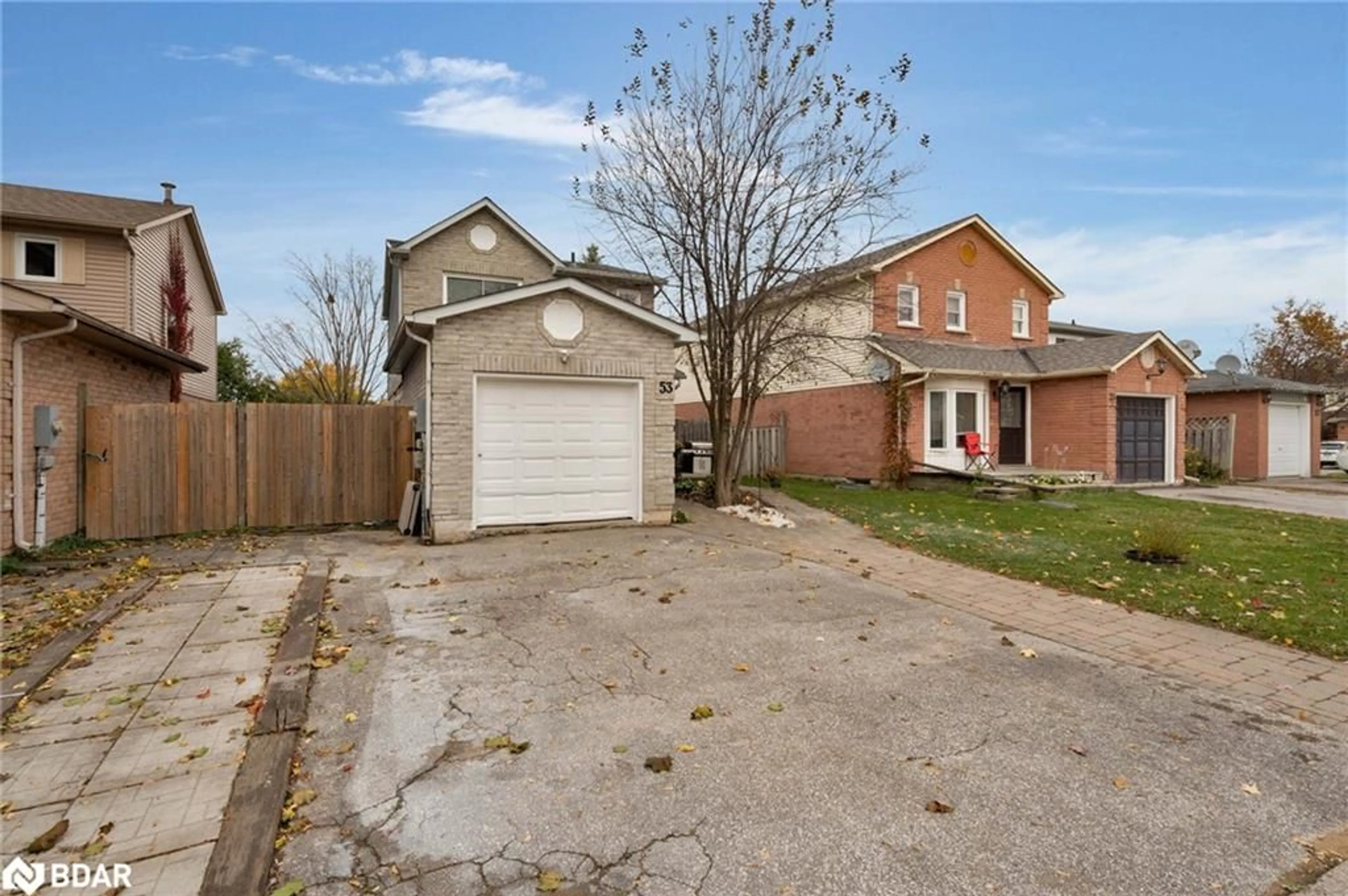 Frontside or backside of a home, the fenced backyard for 53 Hadden Cres, Barrie Ontario L4M 6G6