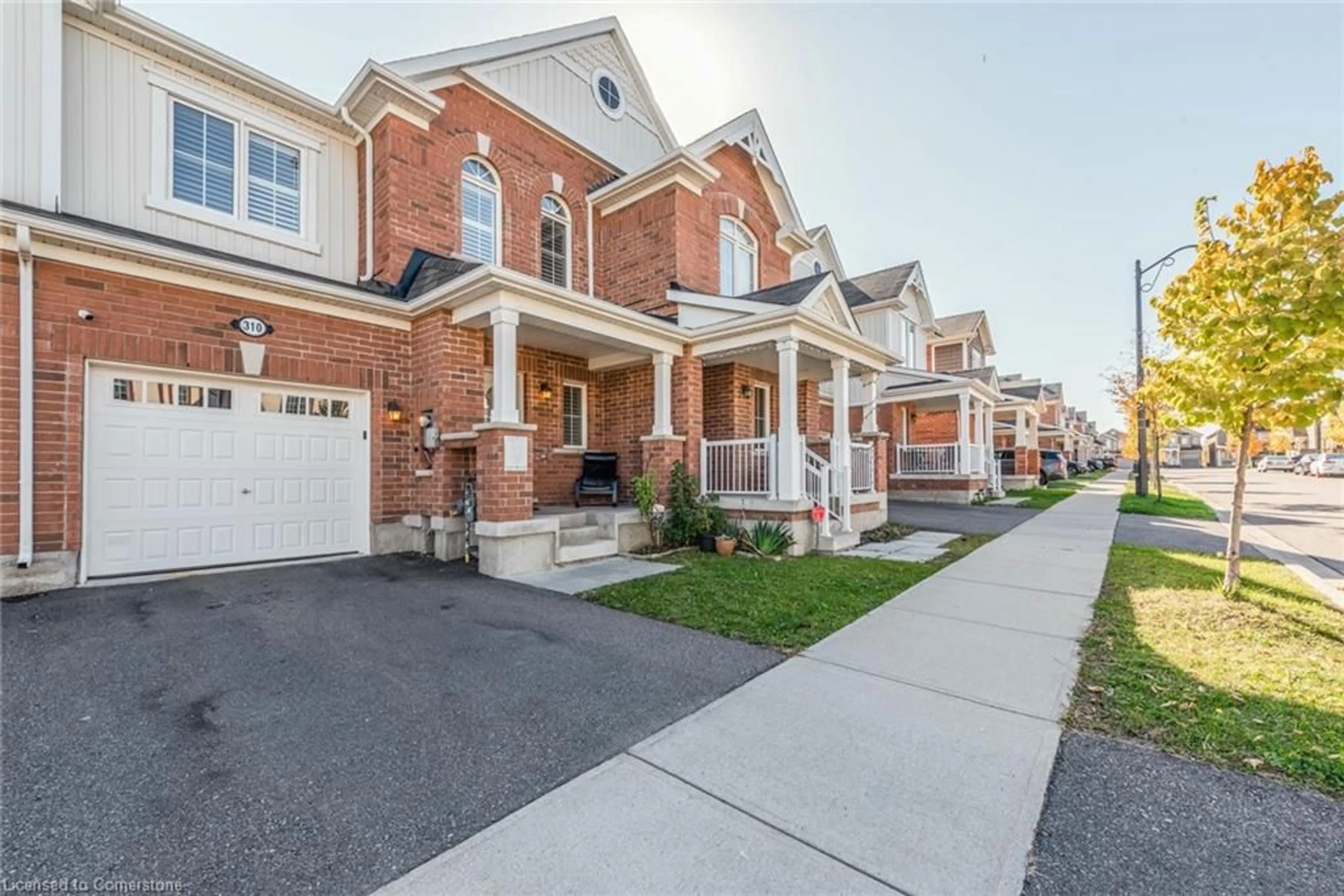 A pic from exterior of the house or condo, the street view for 310 Jean Landing, Milton Ontario L9E 1C6