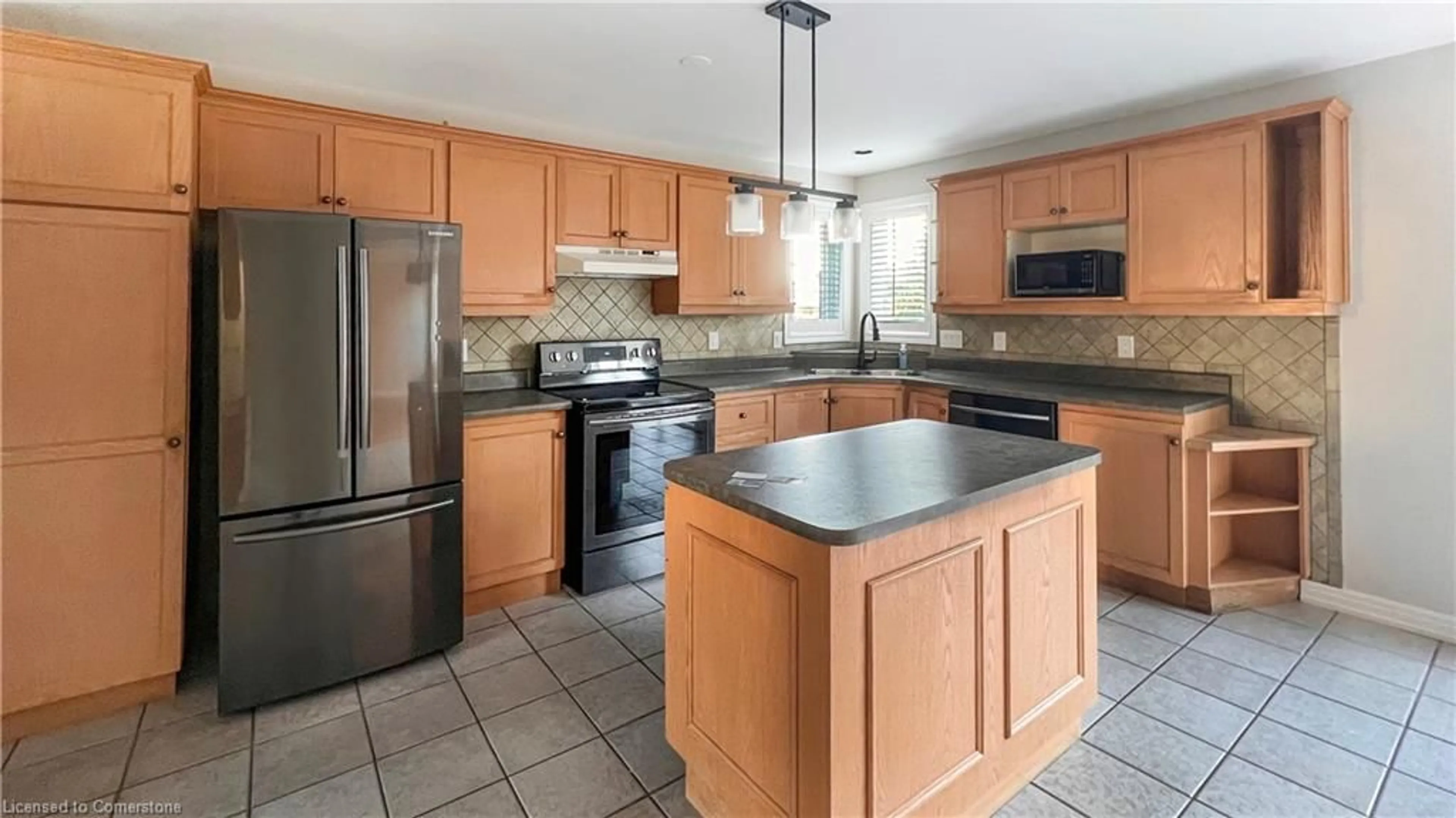 Open concept kitchen for 70 Tallman St, Stoney Creek Ontario L8E 4V9