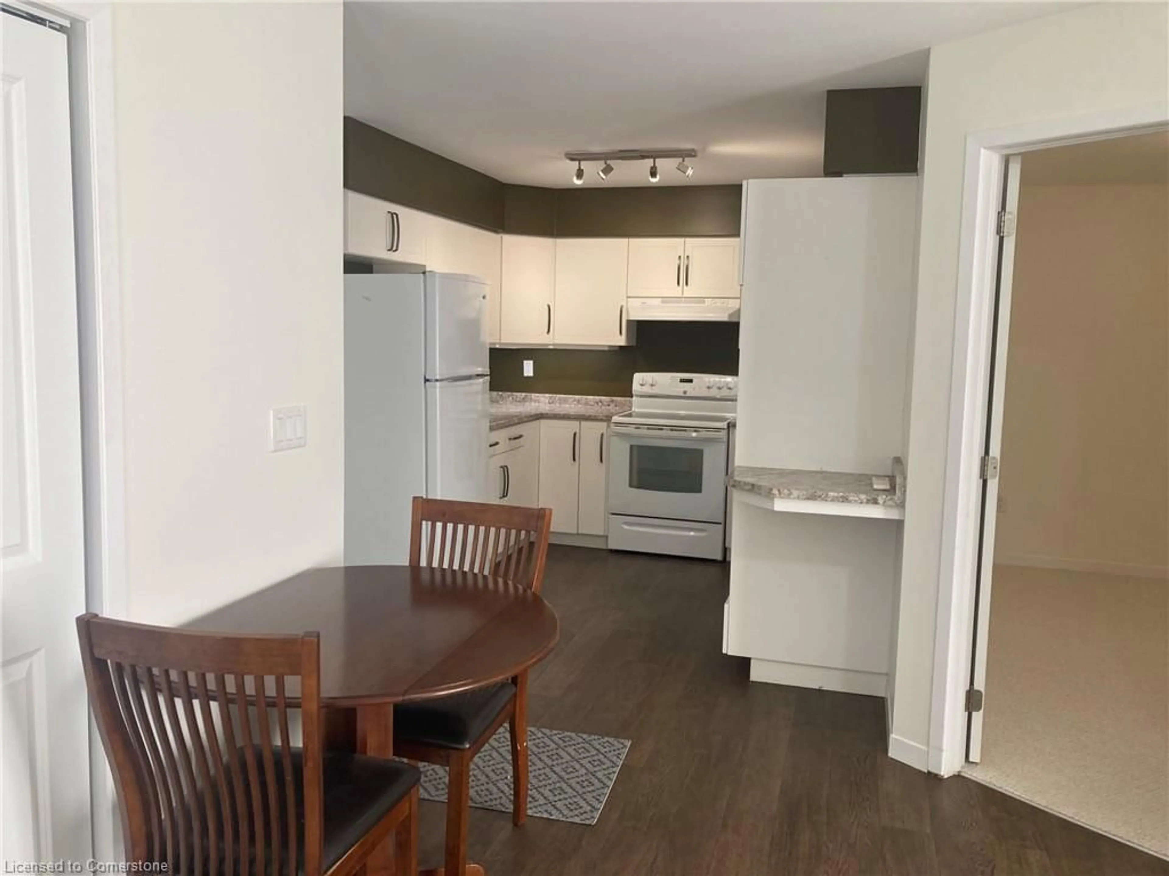 Standard kitchen, wood floors for 850 Alpha St #206, Owen Sound Ontario N4K 5W8