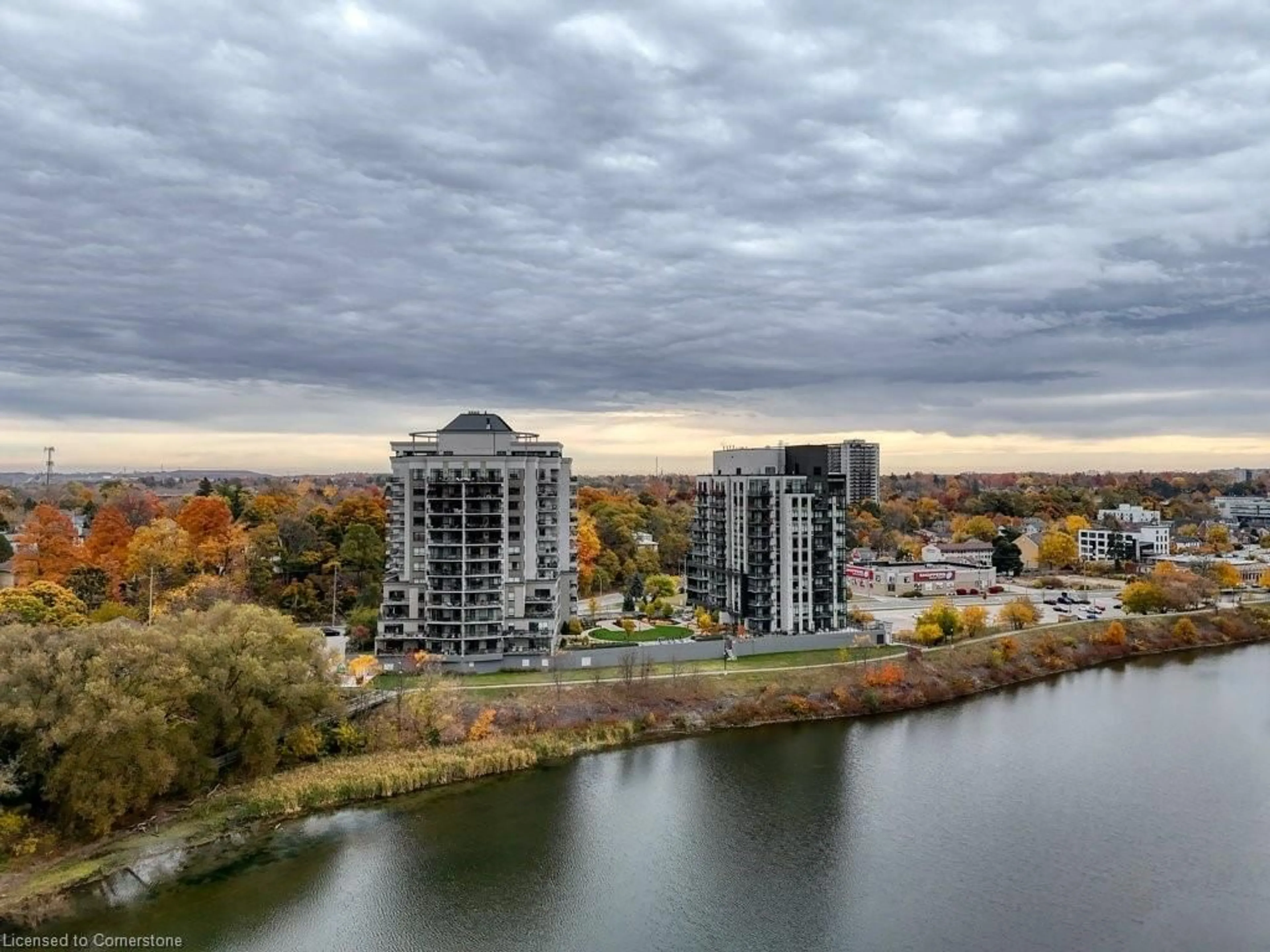 A pic from exterior of the house or condo, the view of city buildings for 170 Water St #302, Cambridge Ontario N1R 3B6