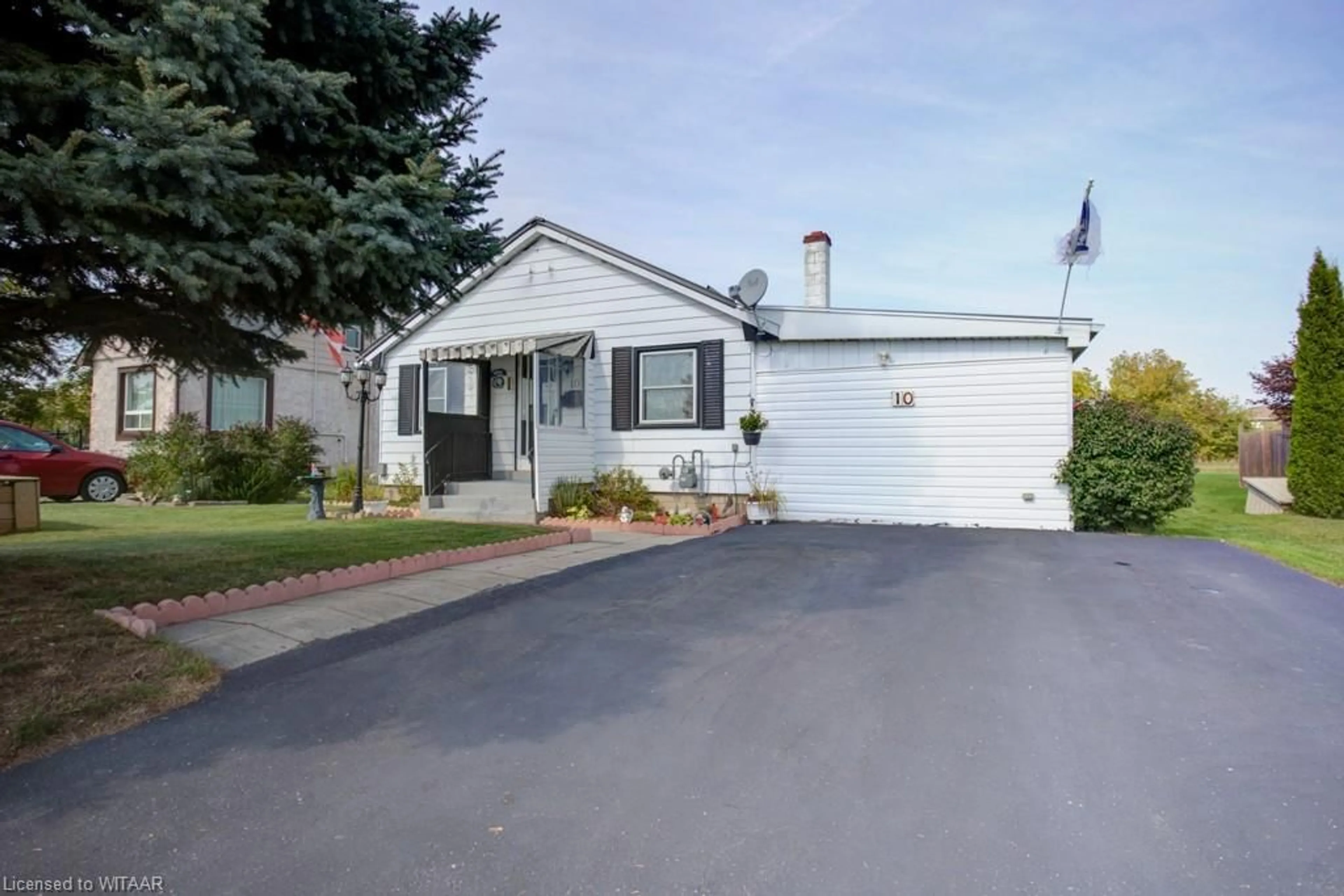 Frontside or backside of a home, the street view for 10 Clarke St, Tillsonburg Ontario N4G 1E1