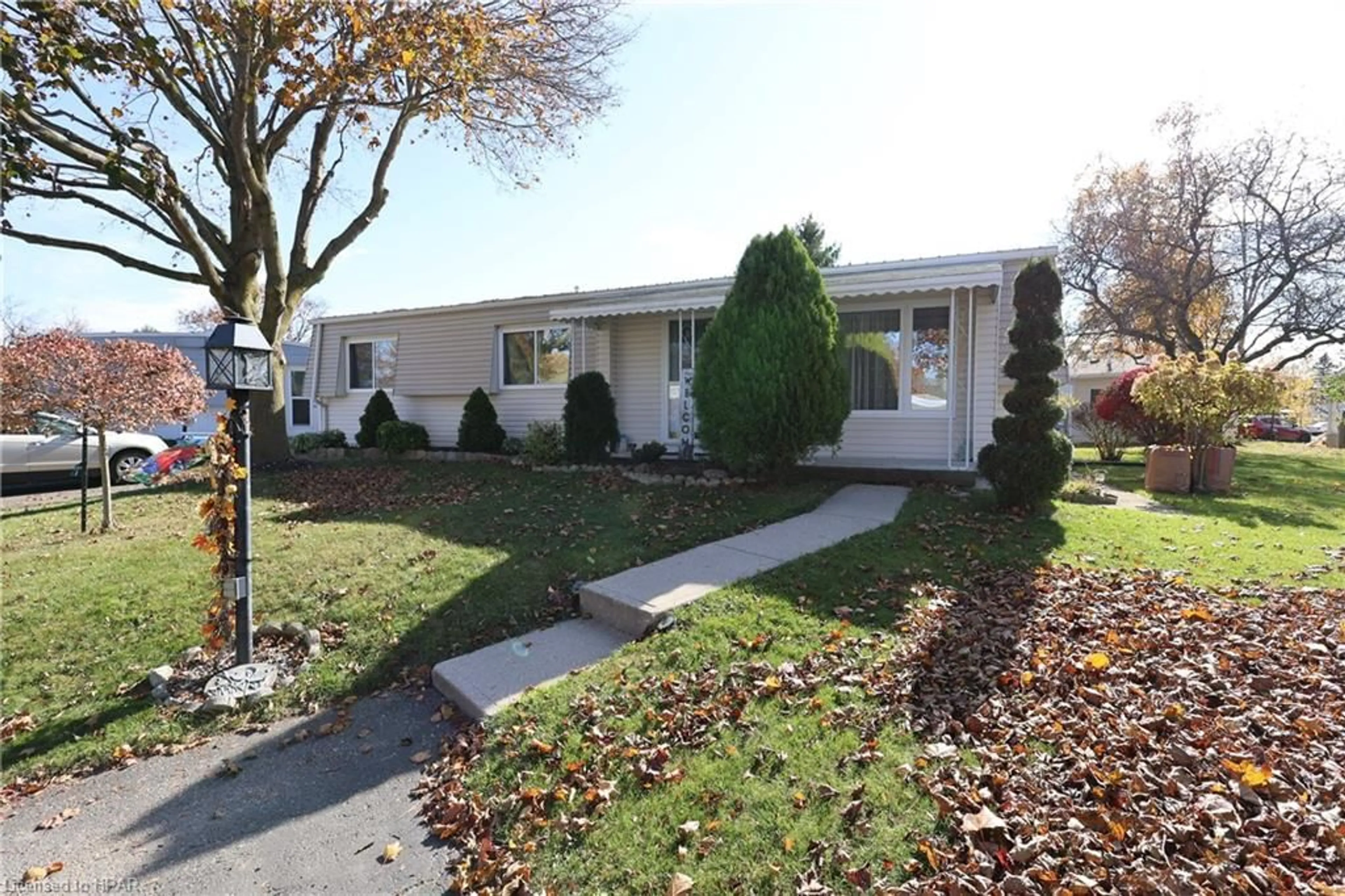 A pic from exterior of the house or condo, the street view for 266 Pebble Beach Pky, Grand Bend Ontario N0M 1T0