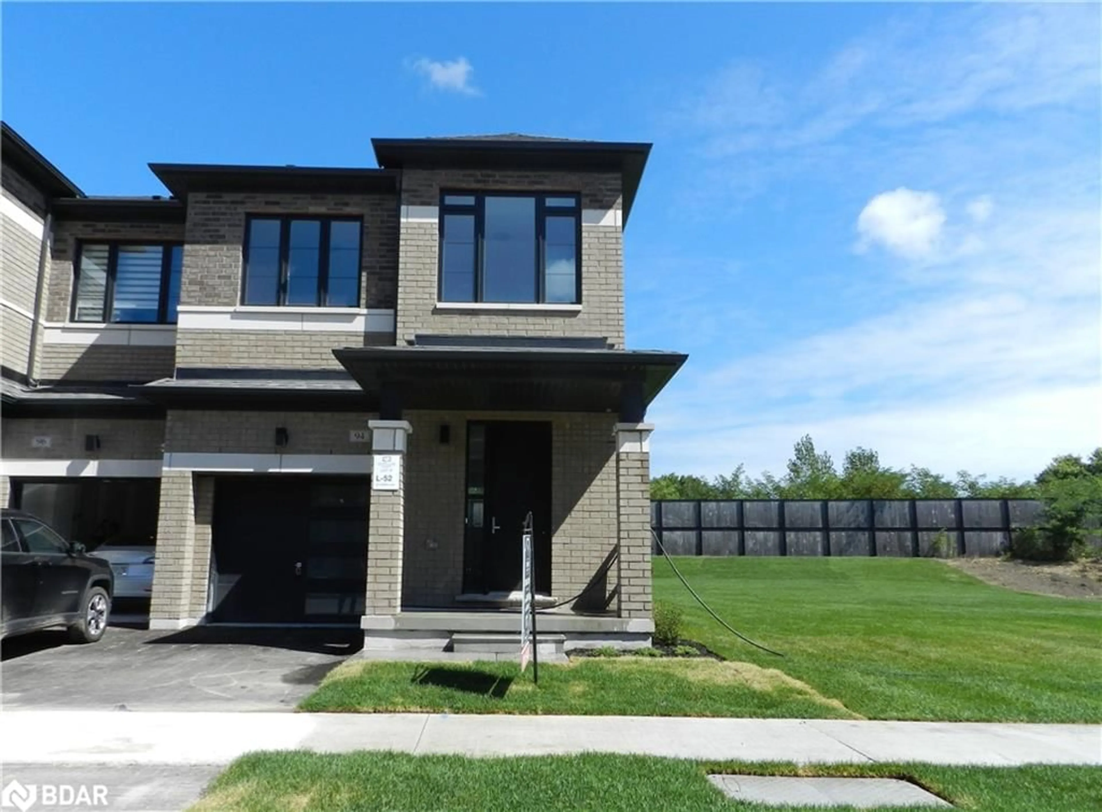 Frontside or backside of a home, the front or back of building for 94 Turnberry Lane, Barrie Ontario L4N 6K7