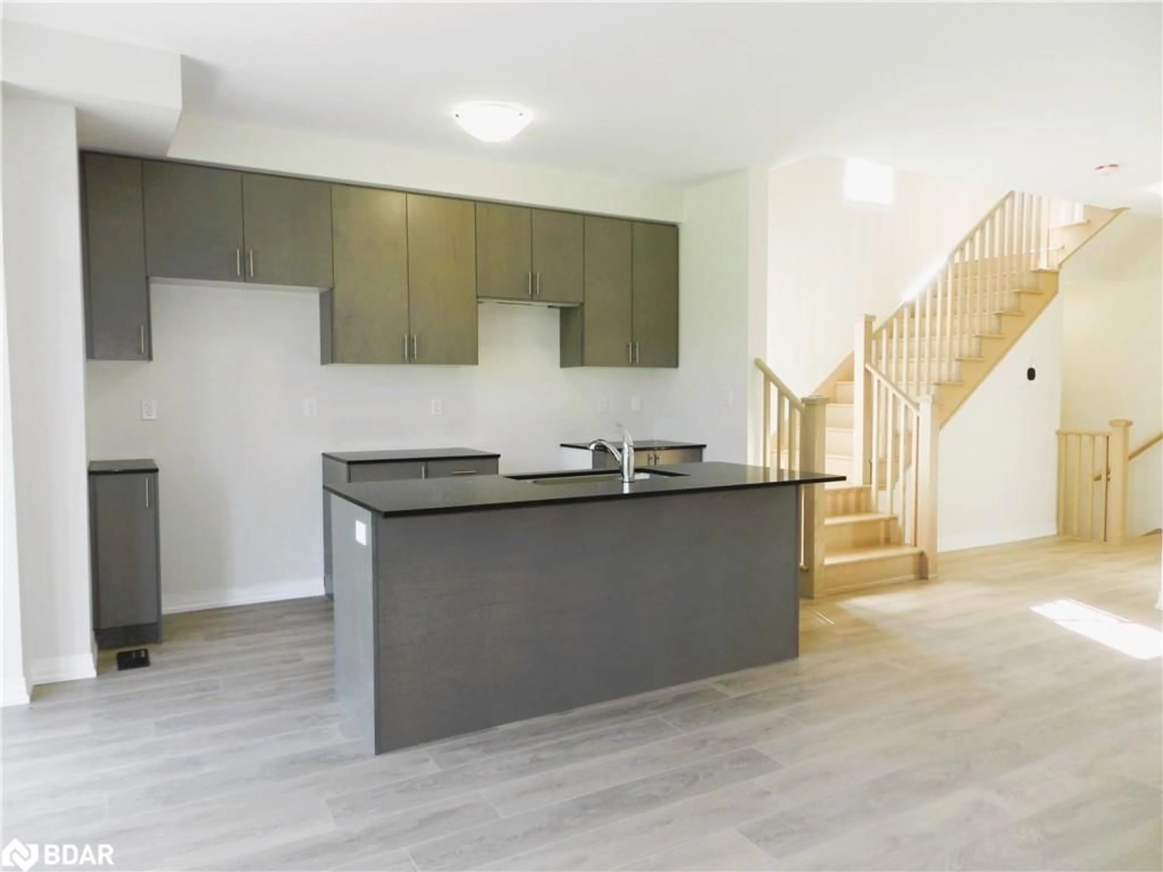 Open concept kitchen for 94 Turnberry Lane, Barrie Ontario L4N 6K7