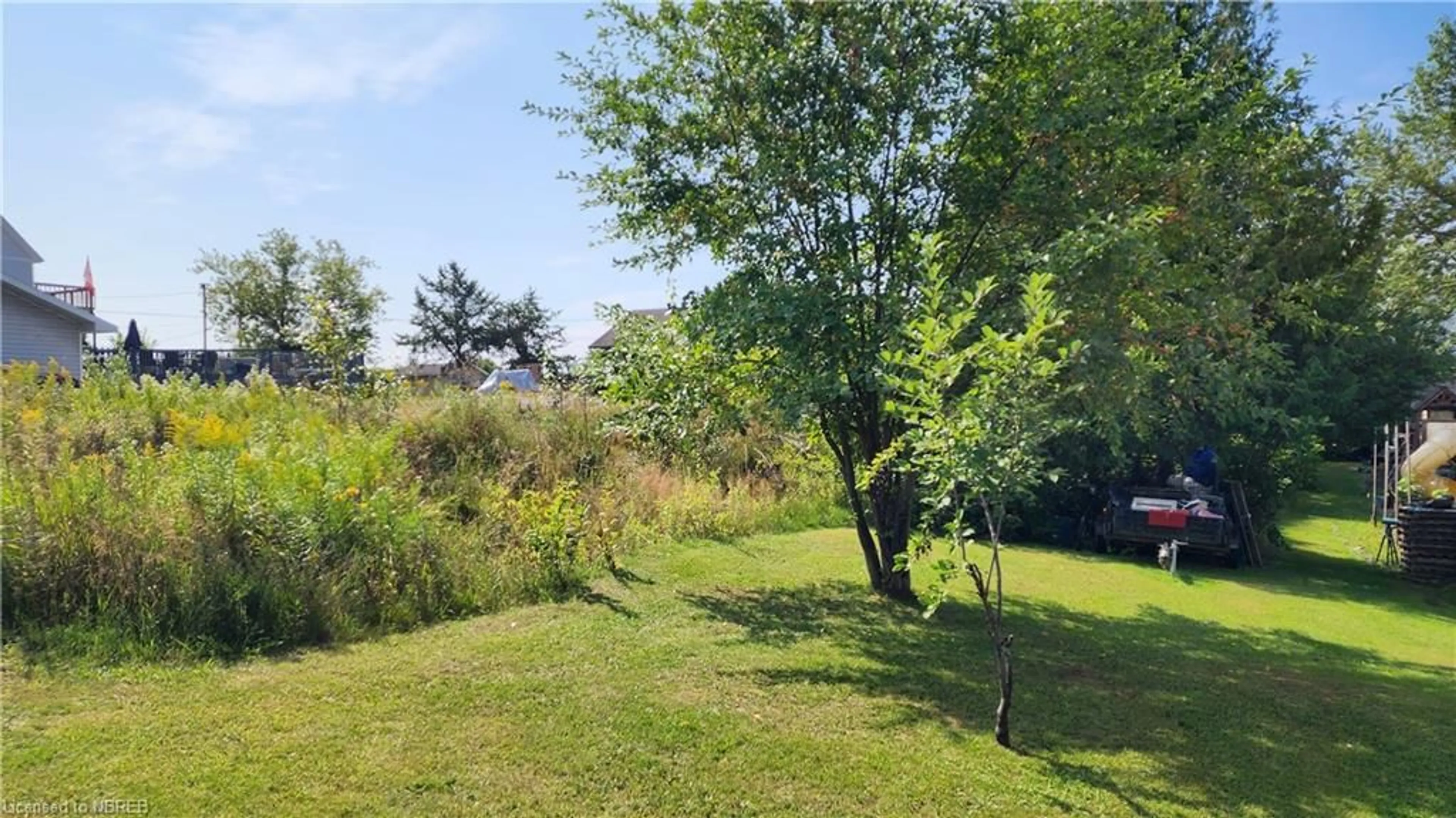 Patio, the fenced backyard for 14 Hay St, Cache Bay Ontario P0H 1G0