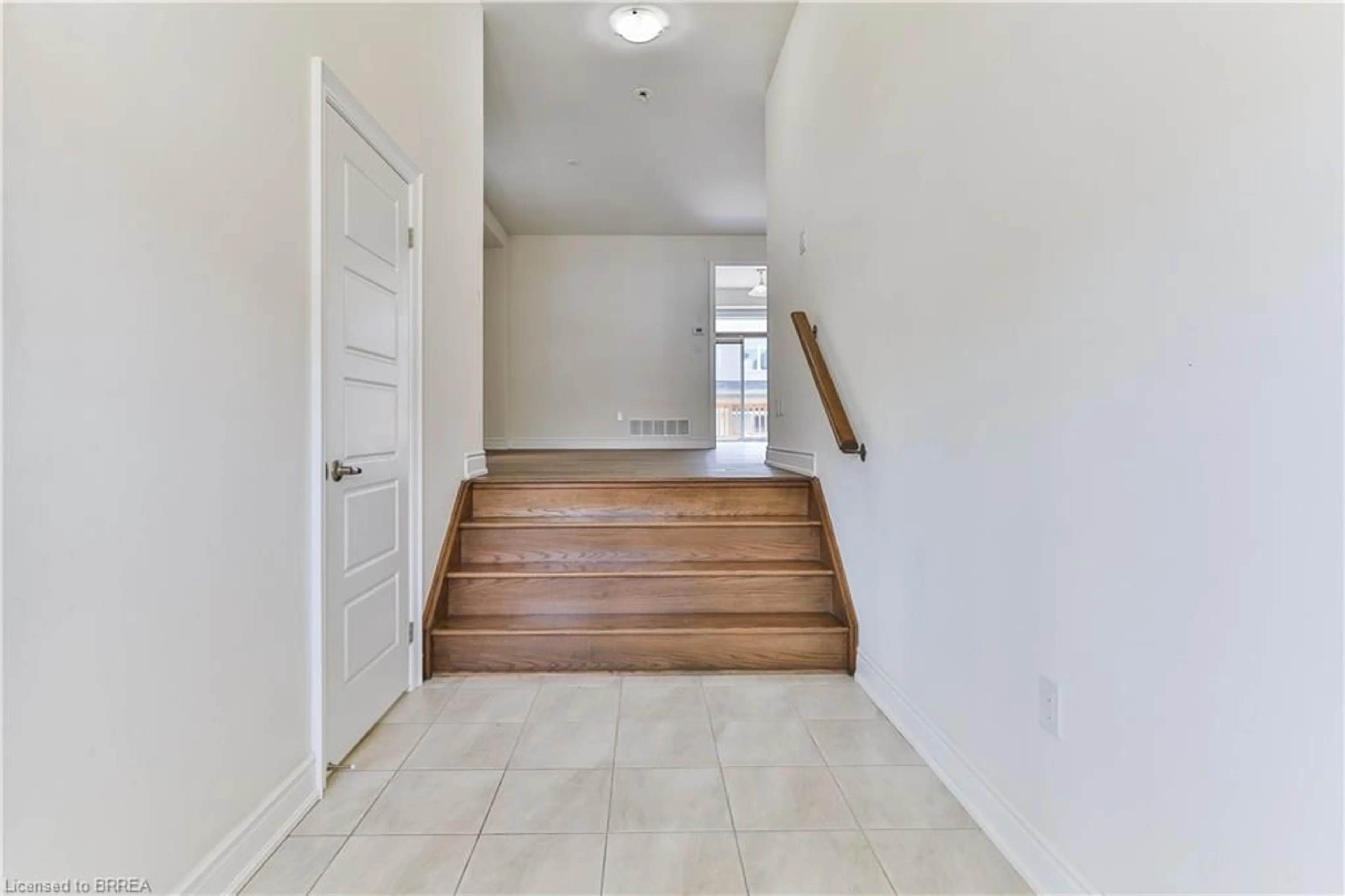 Indoor entryway, wood floors for 151 Longboat Run, Brantford Ontario N3T 0R9