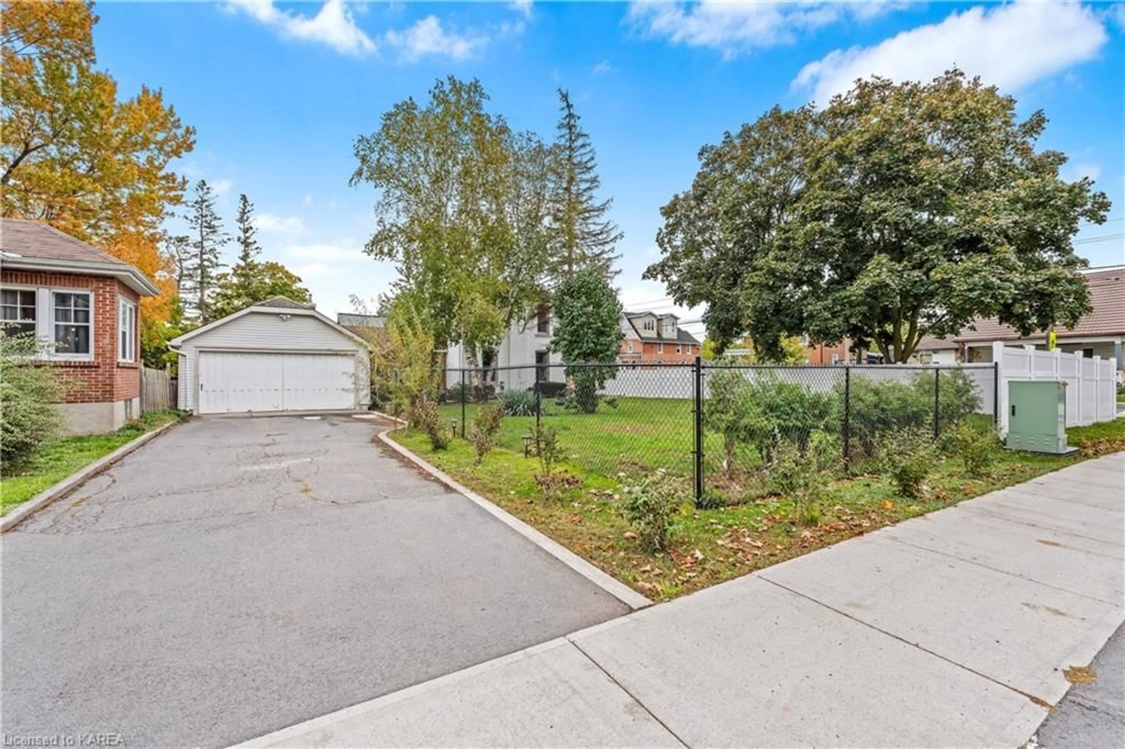 A pic from exterior of the house or condo, the fenced backyard for 209 Centre St, Napanee Ontario K7R 1N7