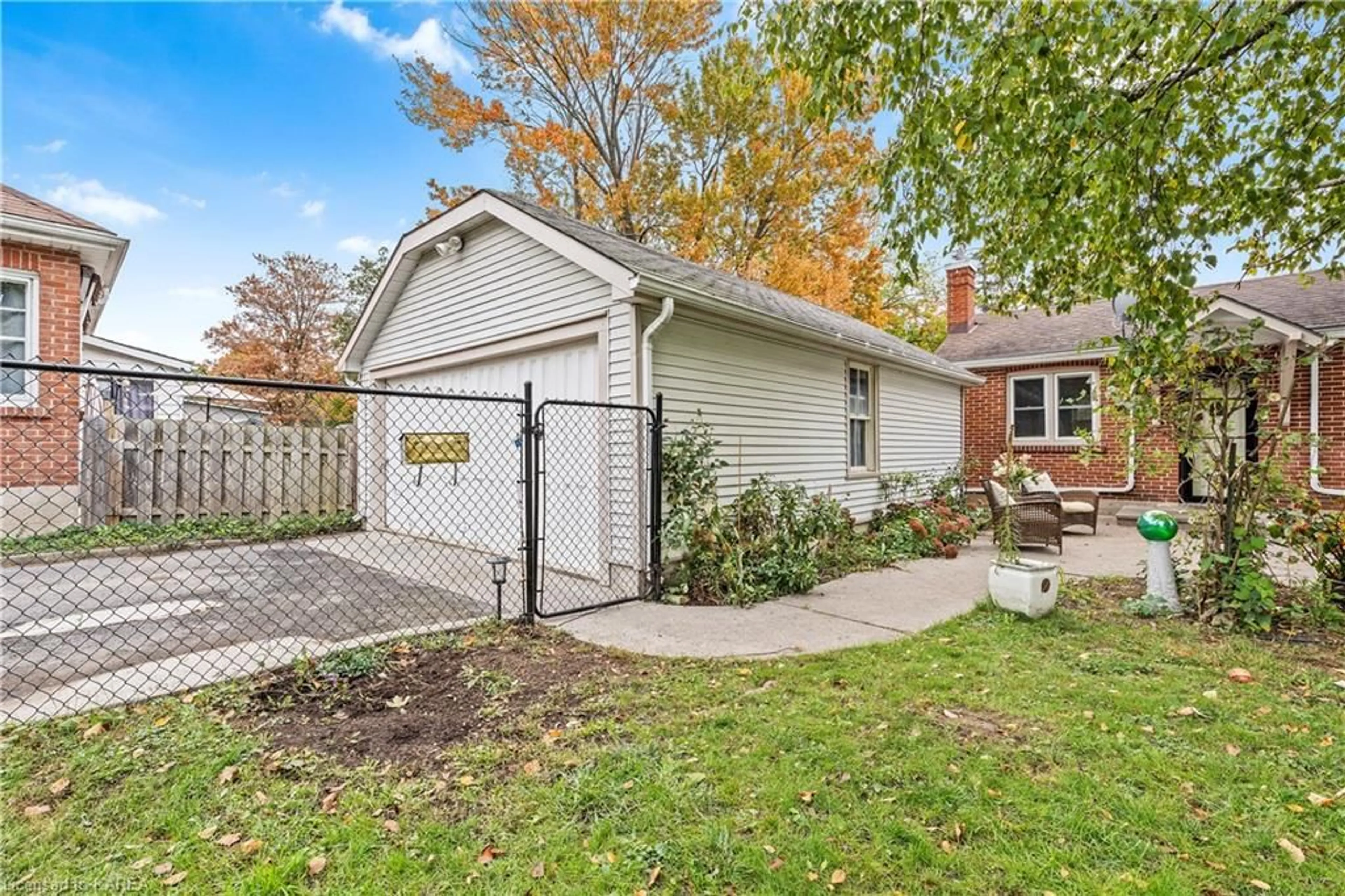 A pic from exterior of the house or condo, the fenced backyard for 209 Centre St, Napanee Ontario K7R 1N7