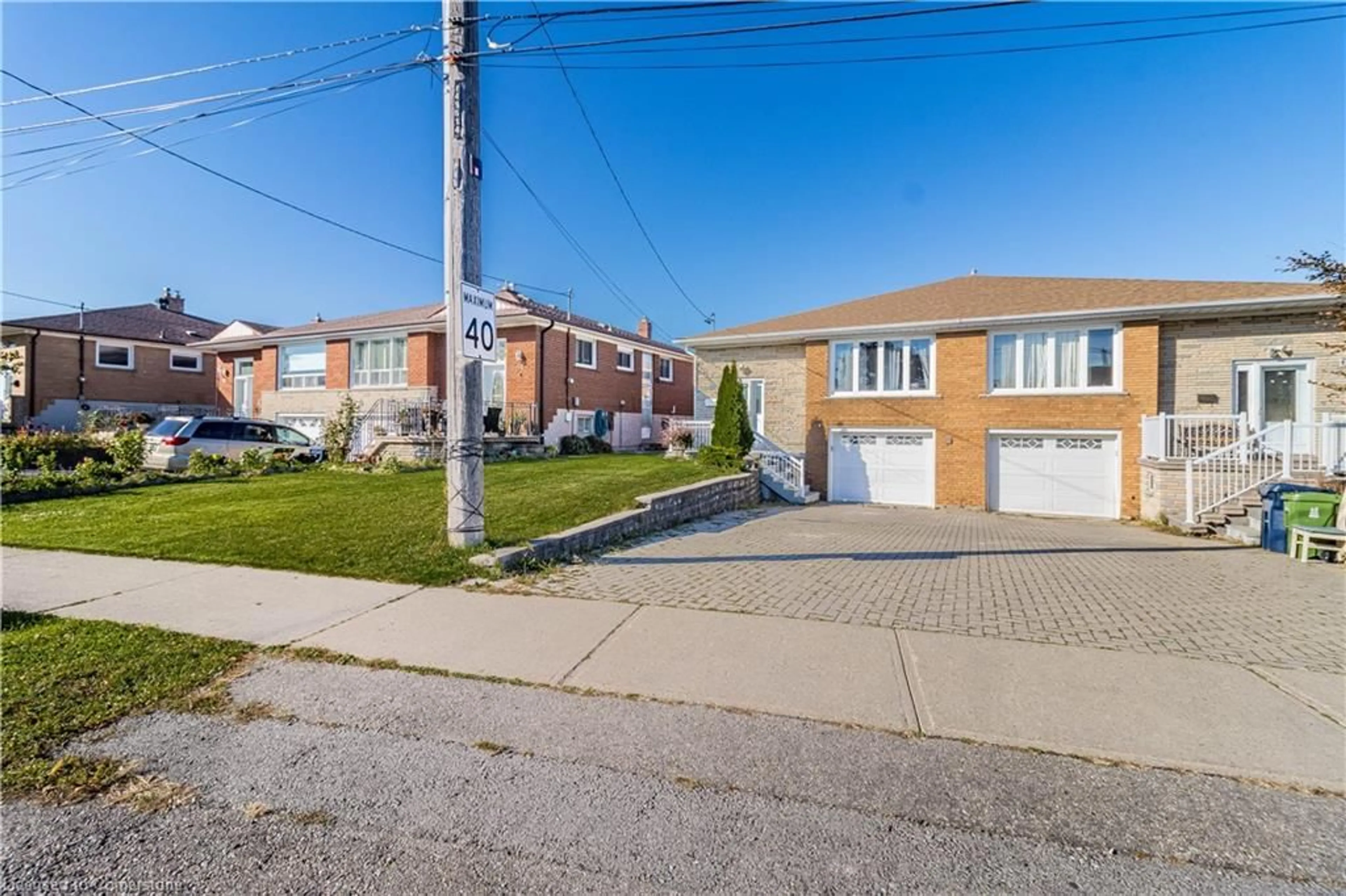 A pic from exterior of the house or condo, the street view for 66 Arleta Ave, Toronto Ontario M3L 2E7