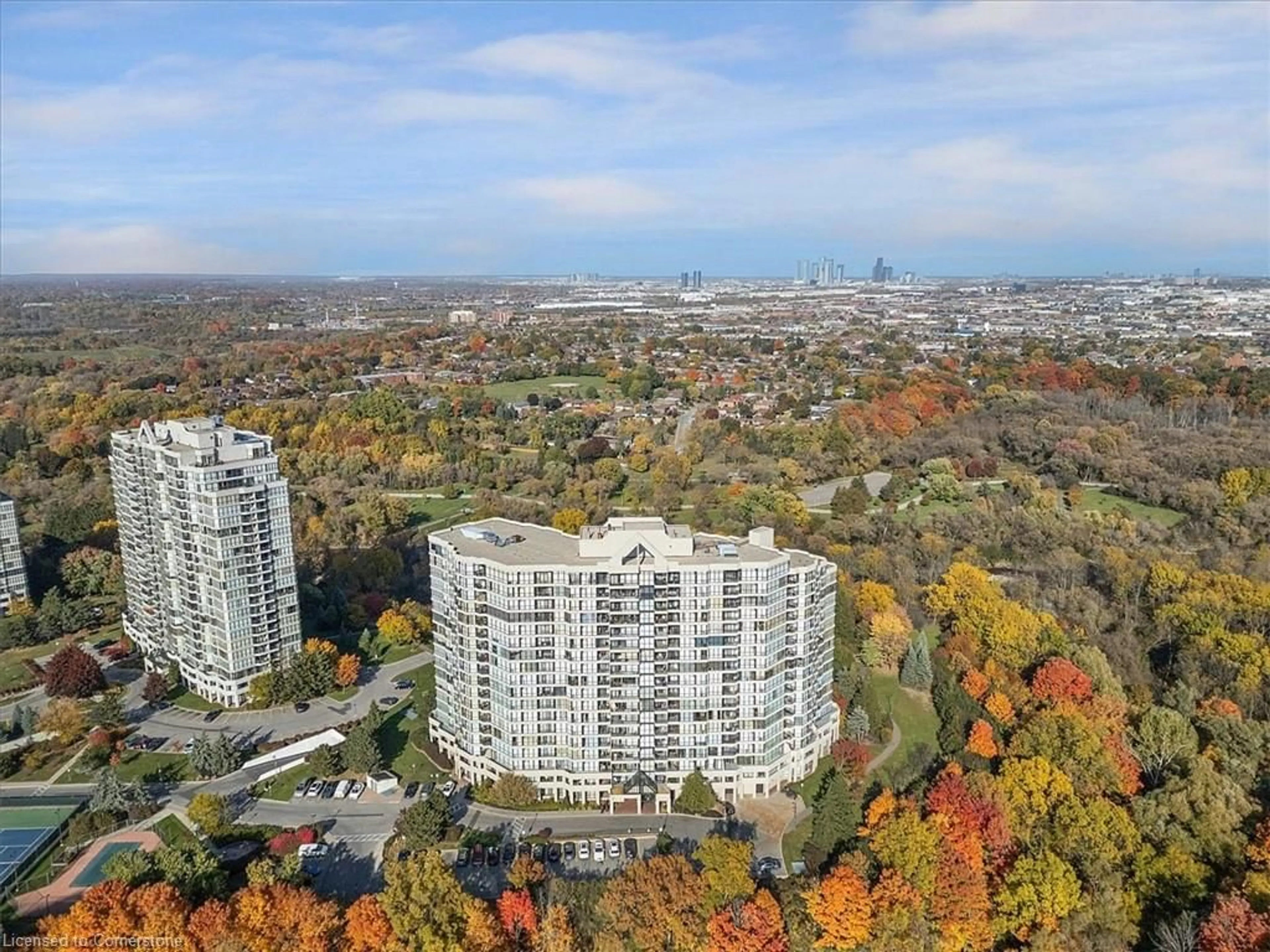 A pic from exterior of the house or condo, the view of city buildings for 5 Rowntree Rd #911, Toronto Ontario M9V 5G9