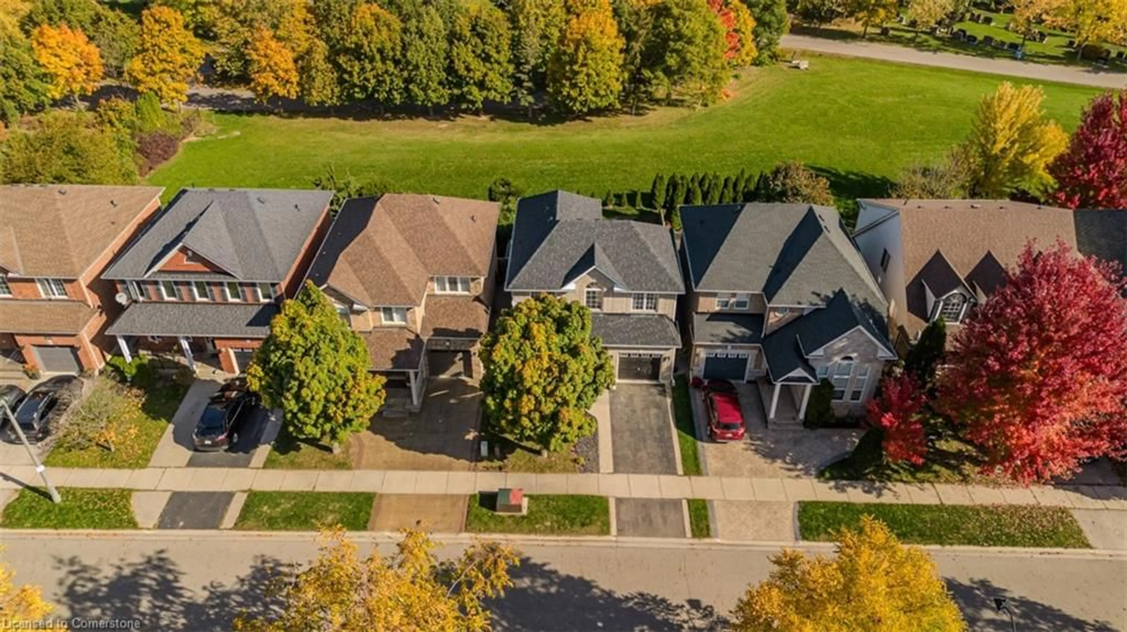 A pic from exterior of the house or condo, the fenced backyard for 2441 Falkland Cres, Oakville Ontario L6M 4Y3