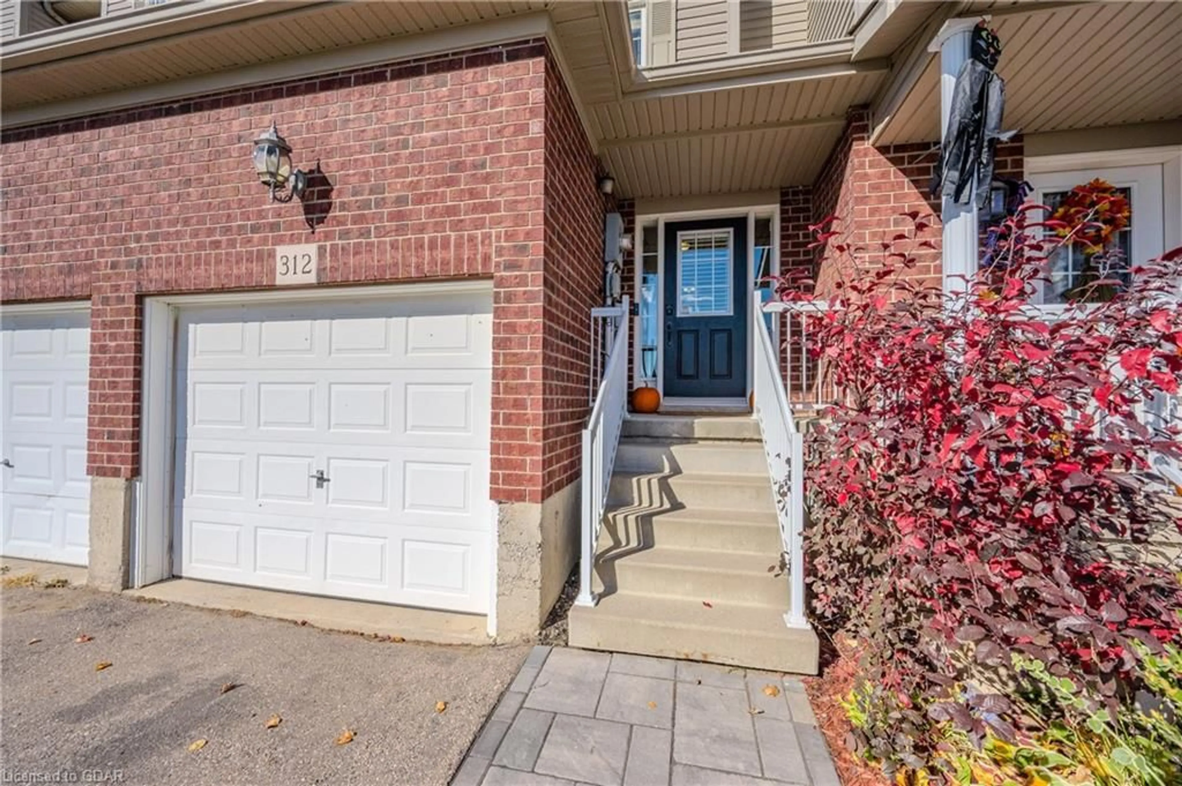 Home with brick exterior material for 312 Parkvale Dr, Kitchener Ontario N2R 1Y7